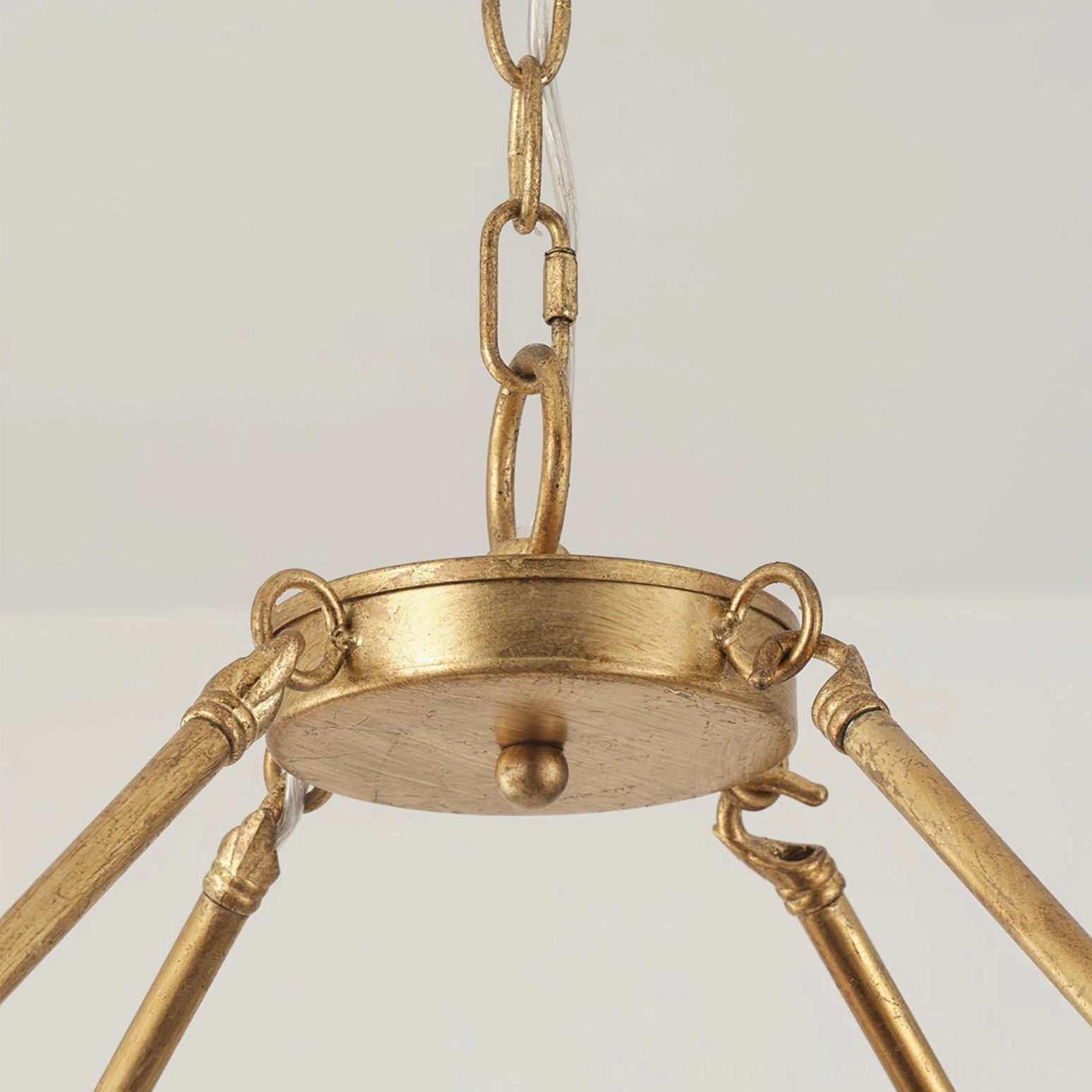 Bottom view of Kayleigh chandelier ceiling hardware, featuring polished brass suspension chain, heavy-duty metal frame, and multi-arm mounting system