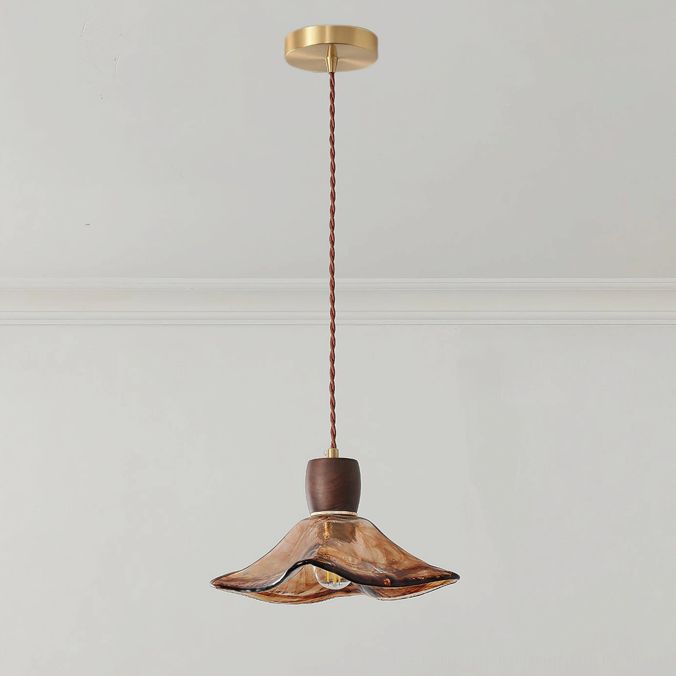 Keju asymmetric wavy amber glass pendant light with warm golden tone and organic hand-blown character