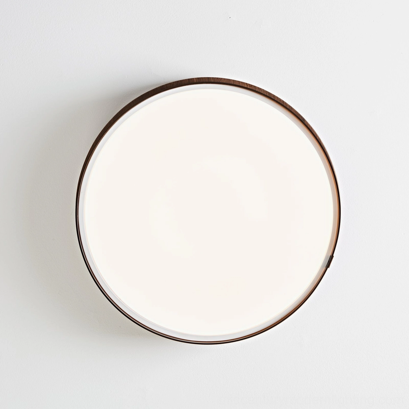 Kelsey flush mount ceiling light lifestyle shot, mid-century modern design creating understated elegance in residential interior