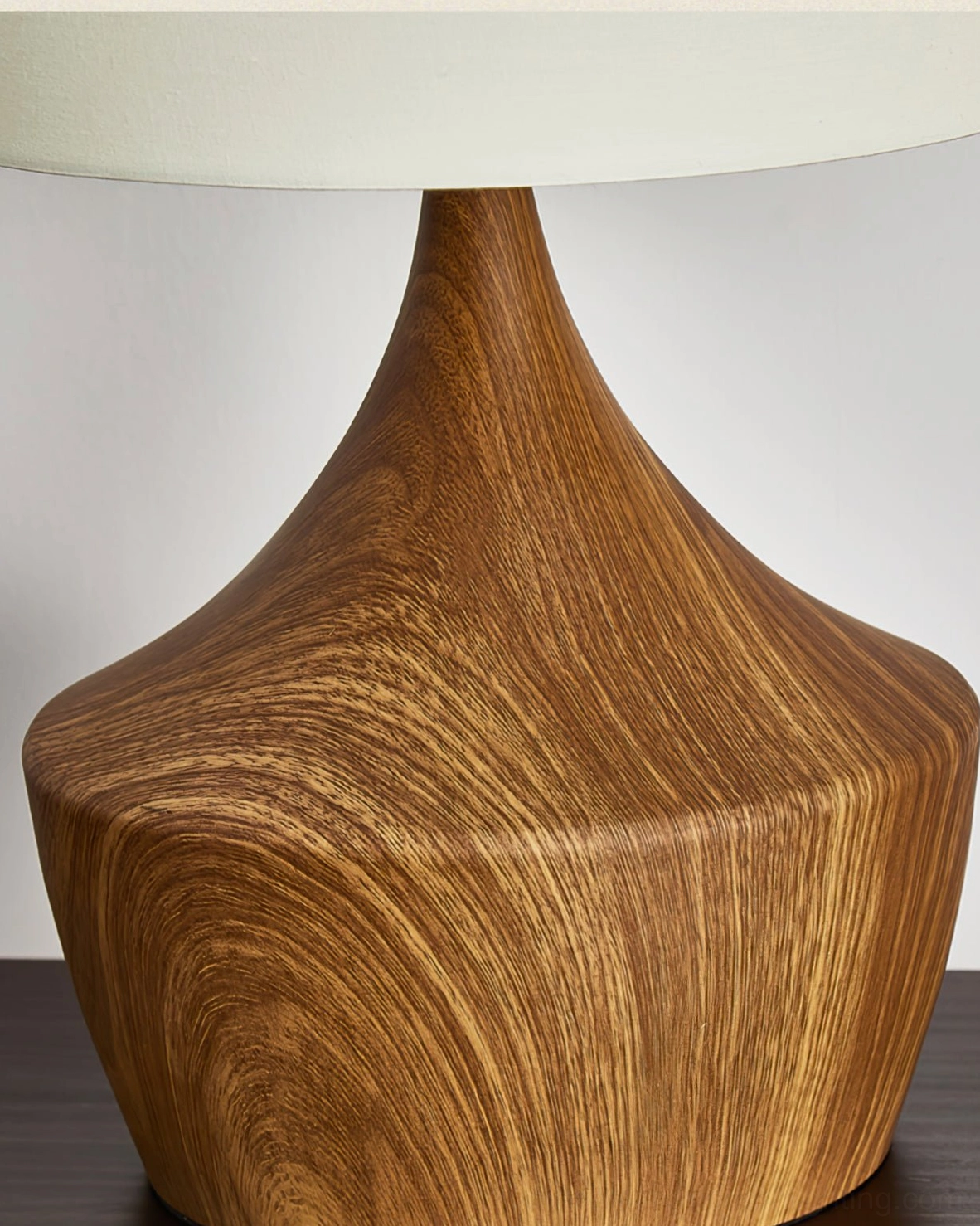 Close-up of Kendra table lamp sculptural walnut wood base with natural wood grain