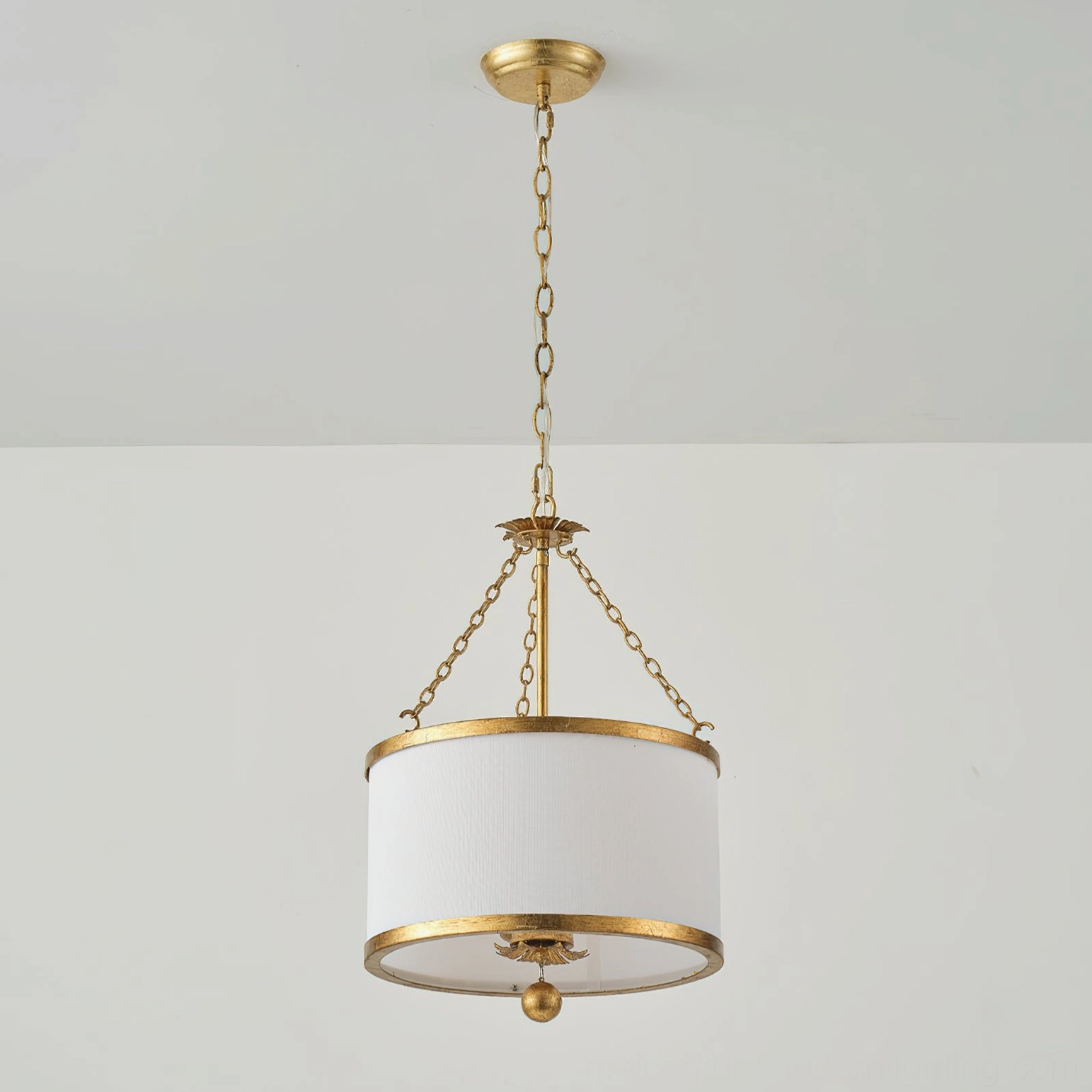 Kian drum pendant light with brass metal frame and white fabric shade, front detail view