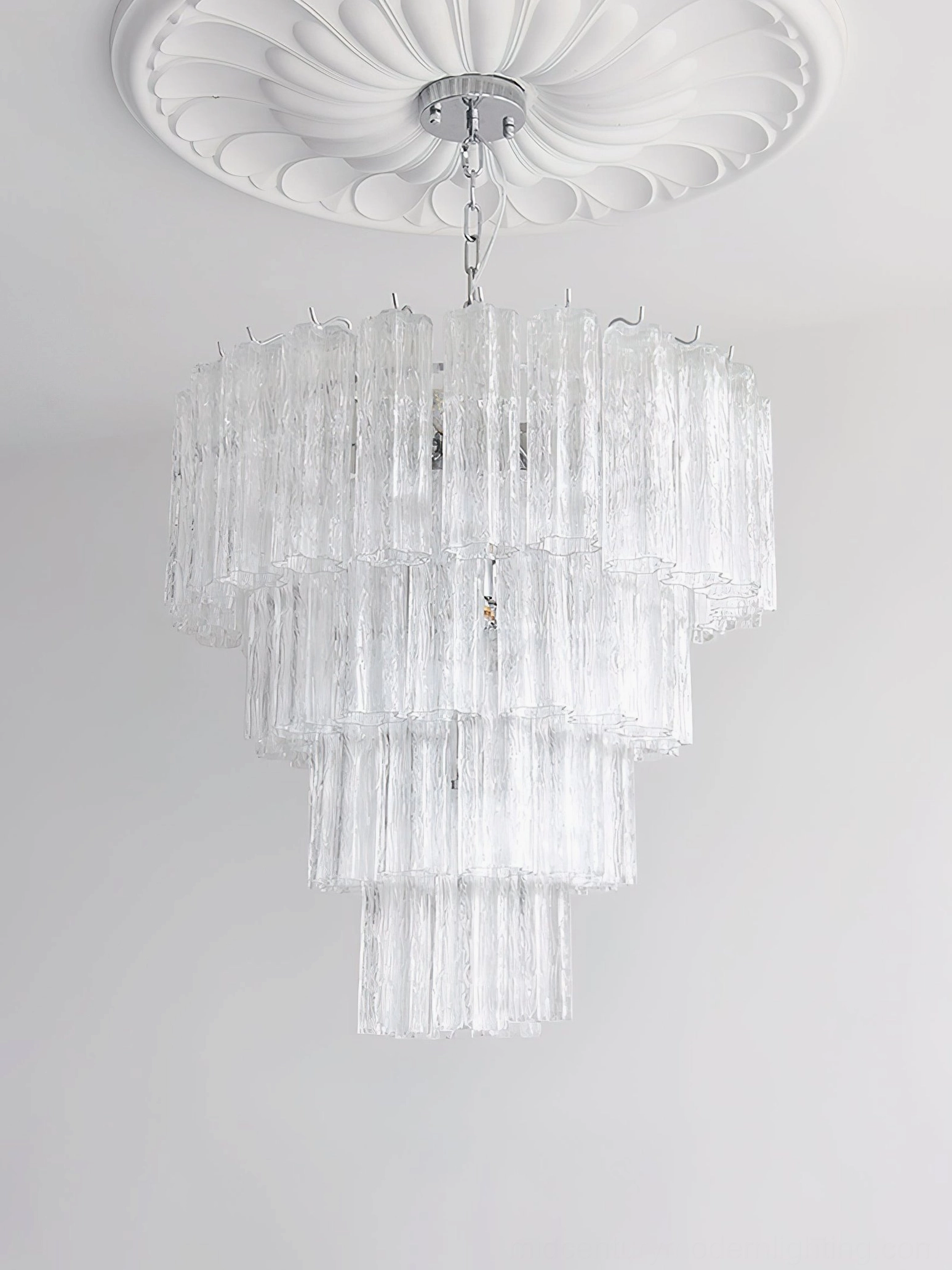 Kieran tiered glass tube chandelier side angle view cascading glass tiers luxury lighting design