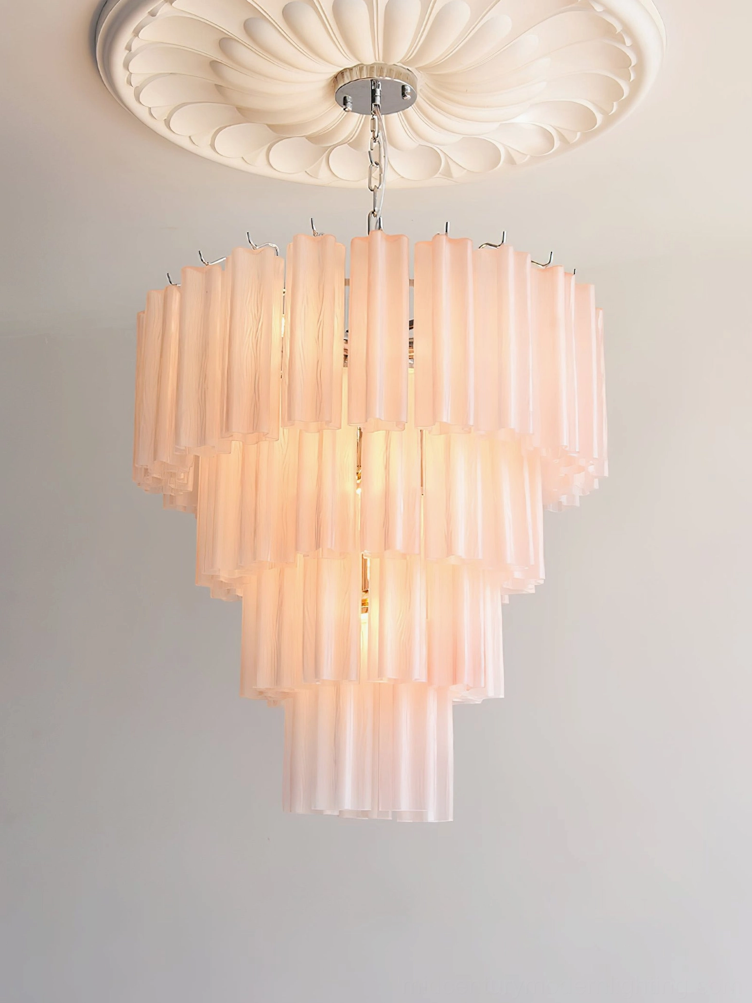 Kieran tiered glass tube chandelier in upscale interior space mid-century modern home decor