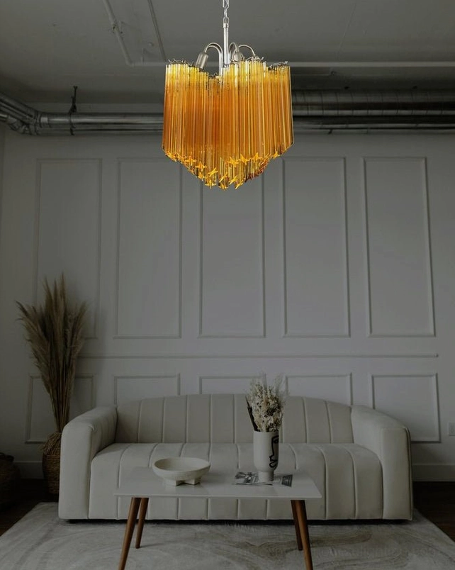 Kite amber chandelier in minimalist paneled living room modern neutral style