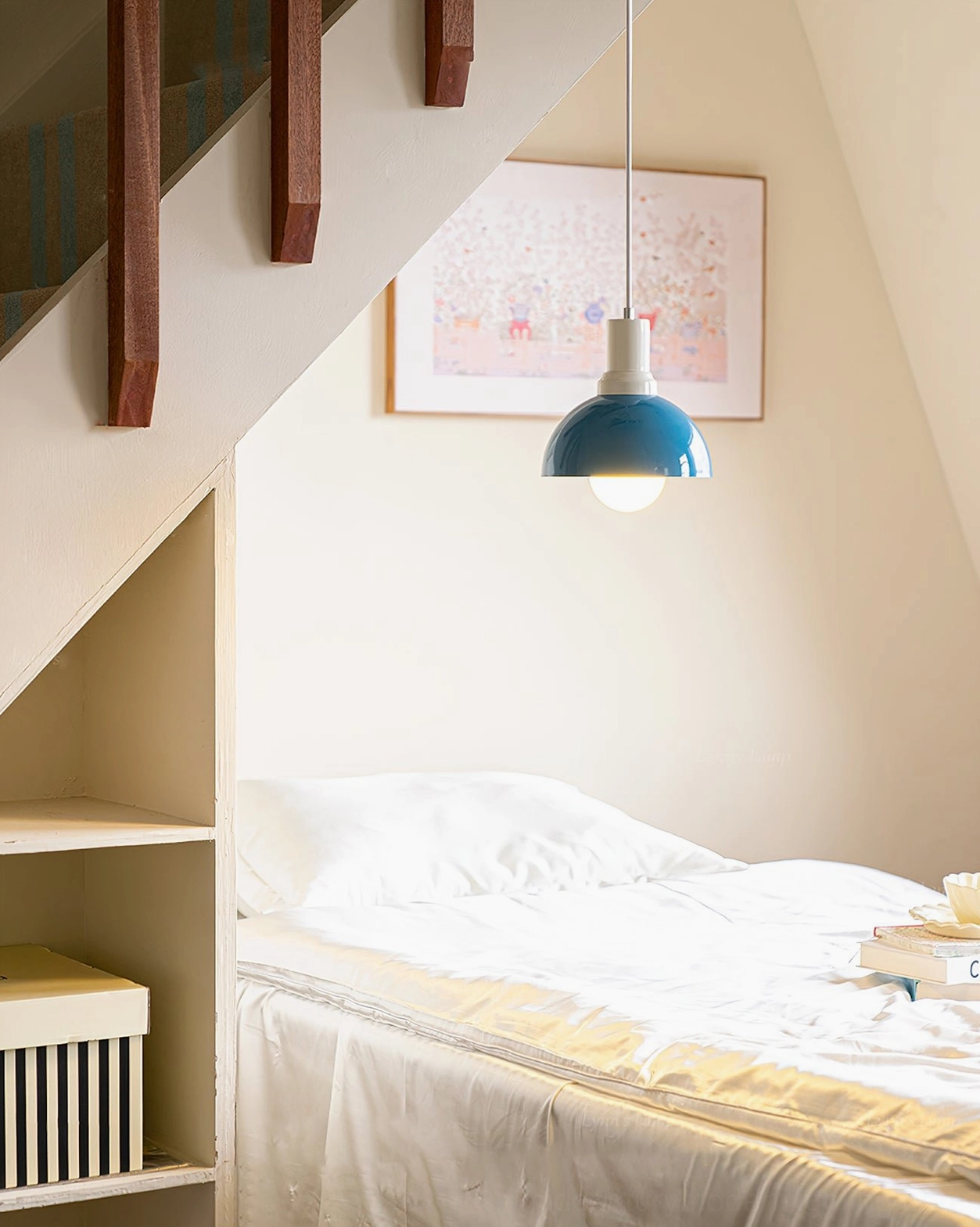 Kleine teal blue pendant light in modern attic bedroom – wooden staircase railing and built-in storage showcase mid-century design integration