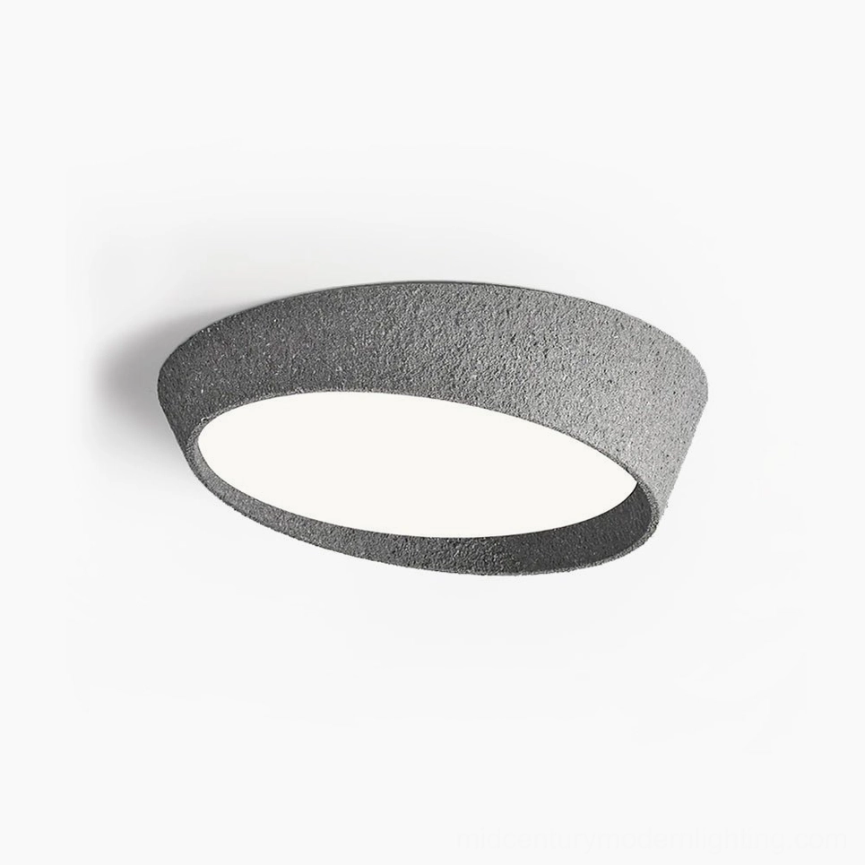 Kuzco dark gray textured ceiling lamp top-down studio view showing detailed surface finish