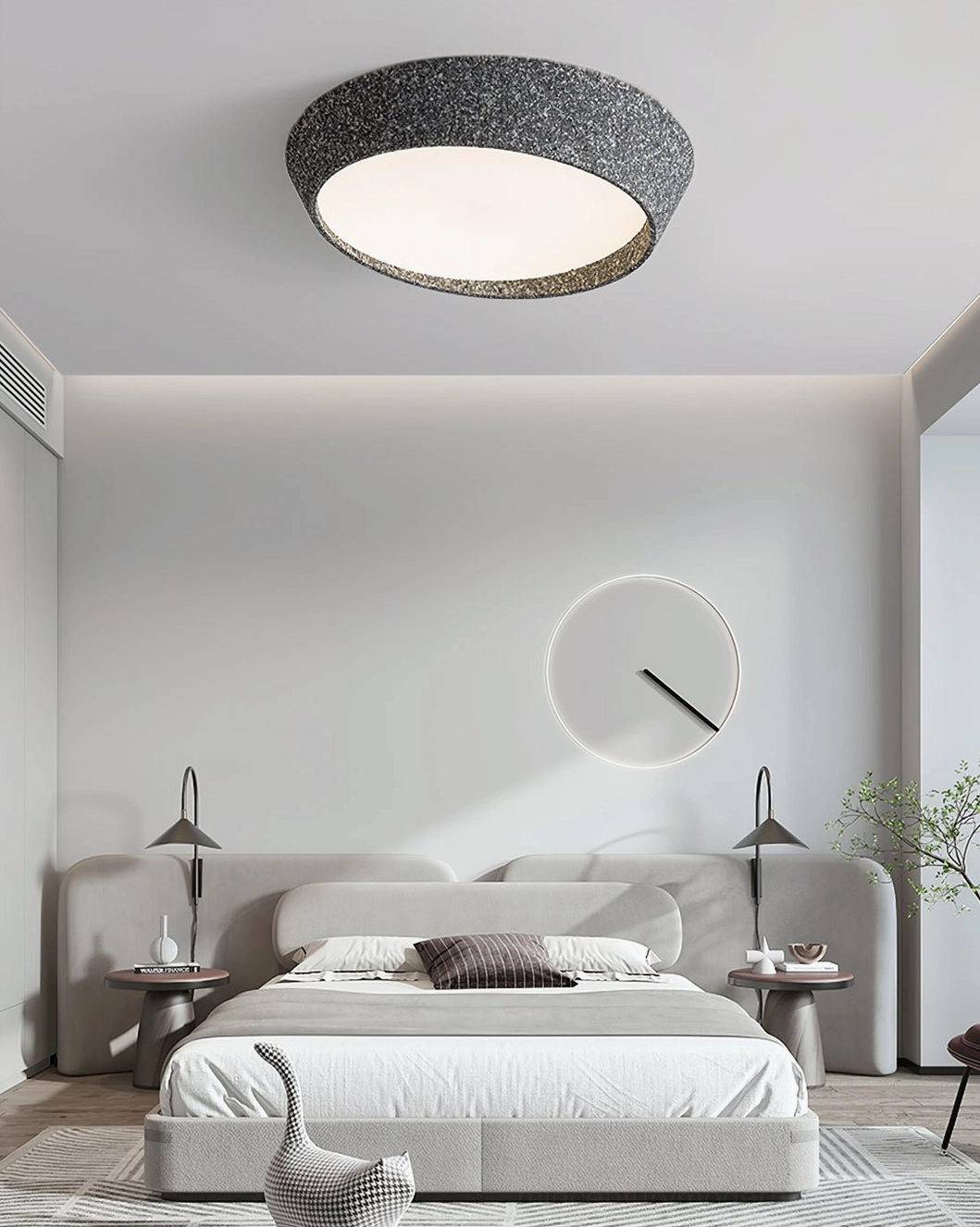 Kuzco modern textured ceiling lamp installed in Scandinavian-style living room