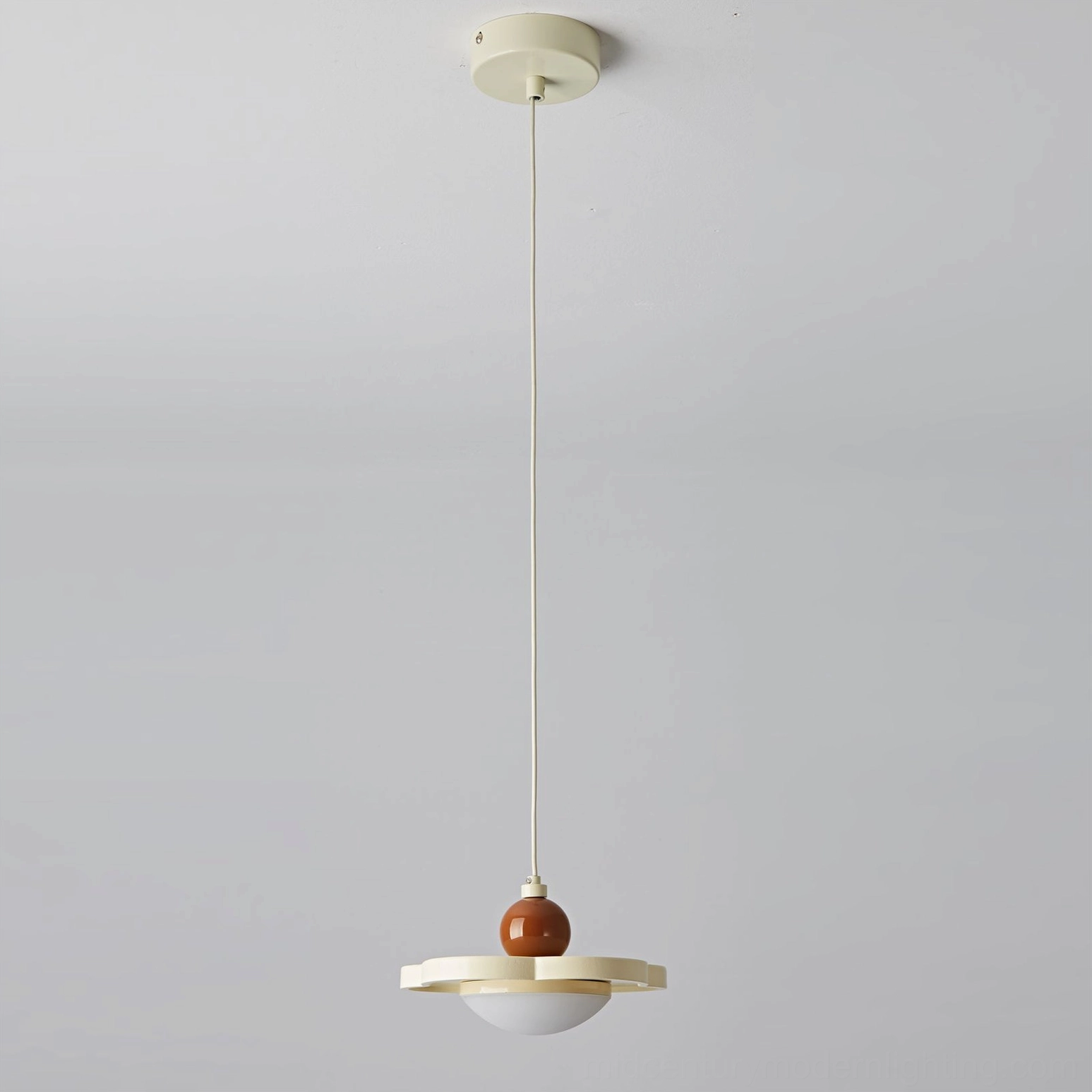 Laguna saucer pendant light with neutral minimalist trim, studio photography front view