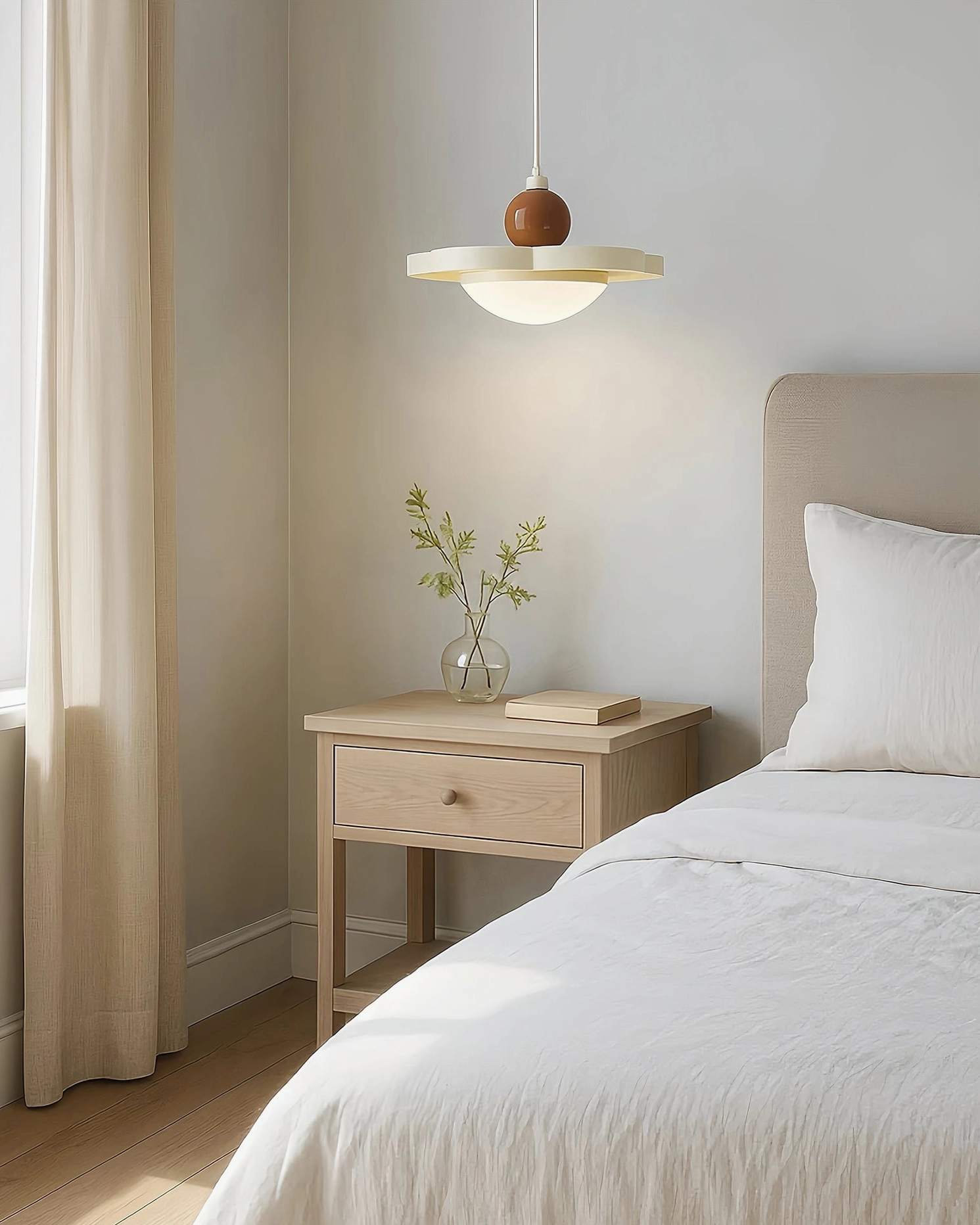 Laguna modern pendant light installed in Nordic style bedroom, soft contemporary ambiance