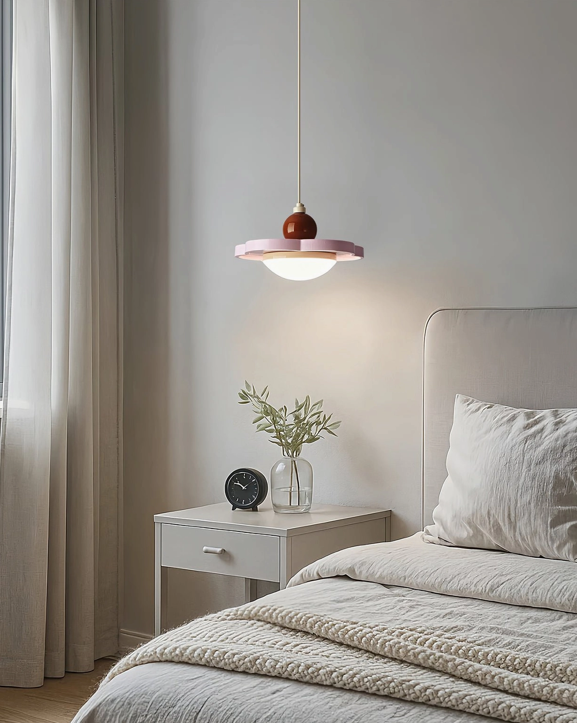 Laguna pendant ceiling lamp with pink accent in cozy Nordic bedroom setting