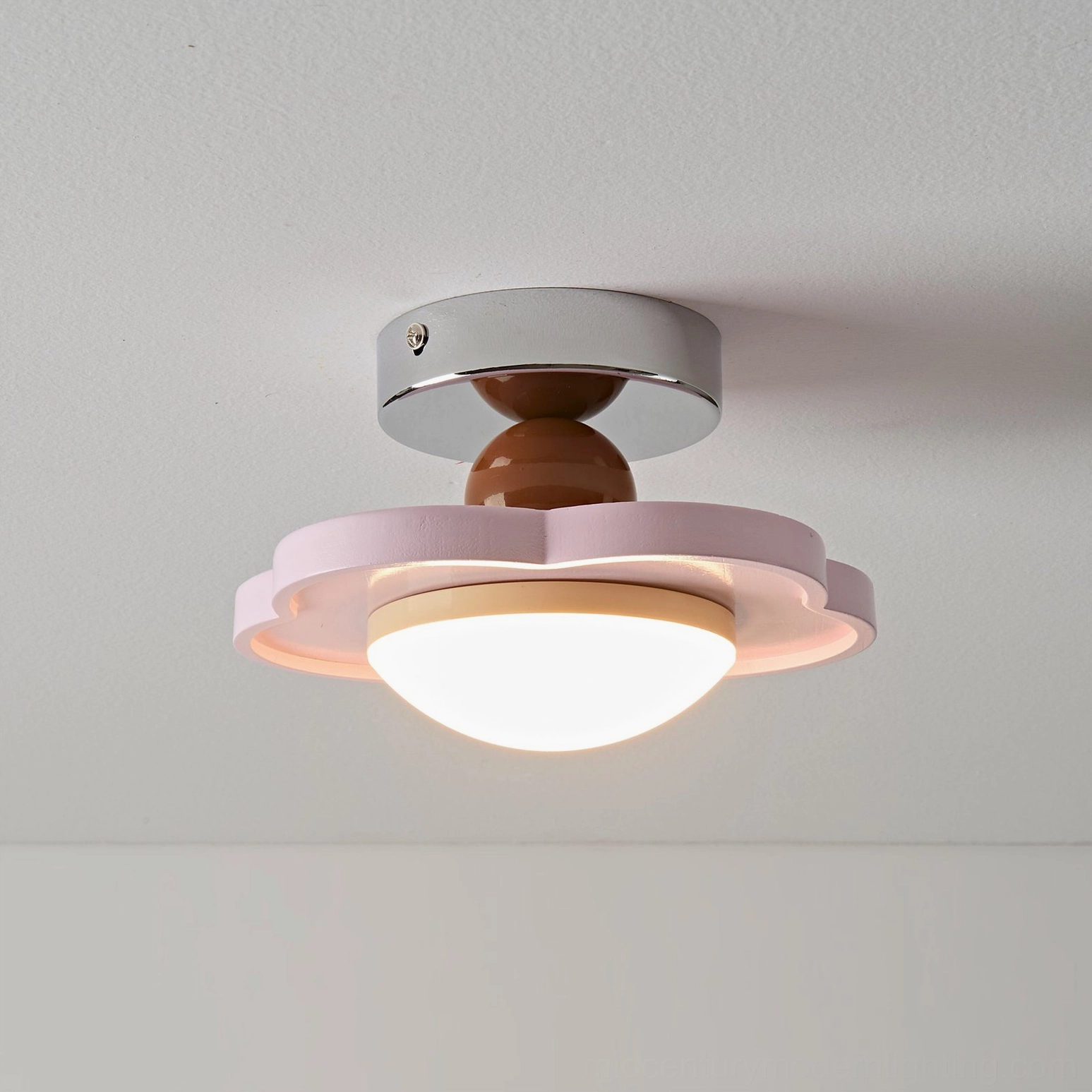 Laguna modern ceiling lamp close-up, resin diffuser segments and metal mounting hardware visible