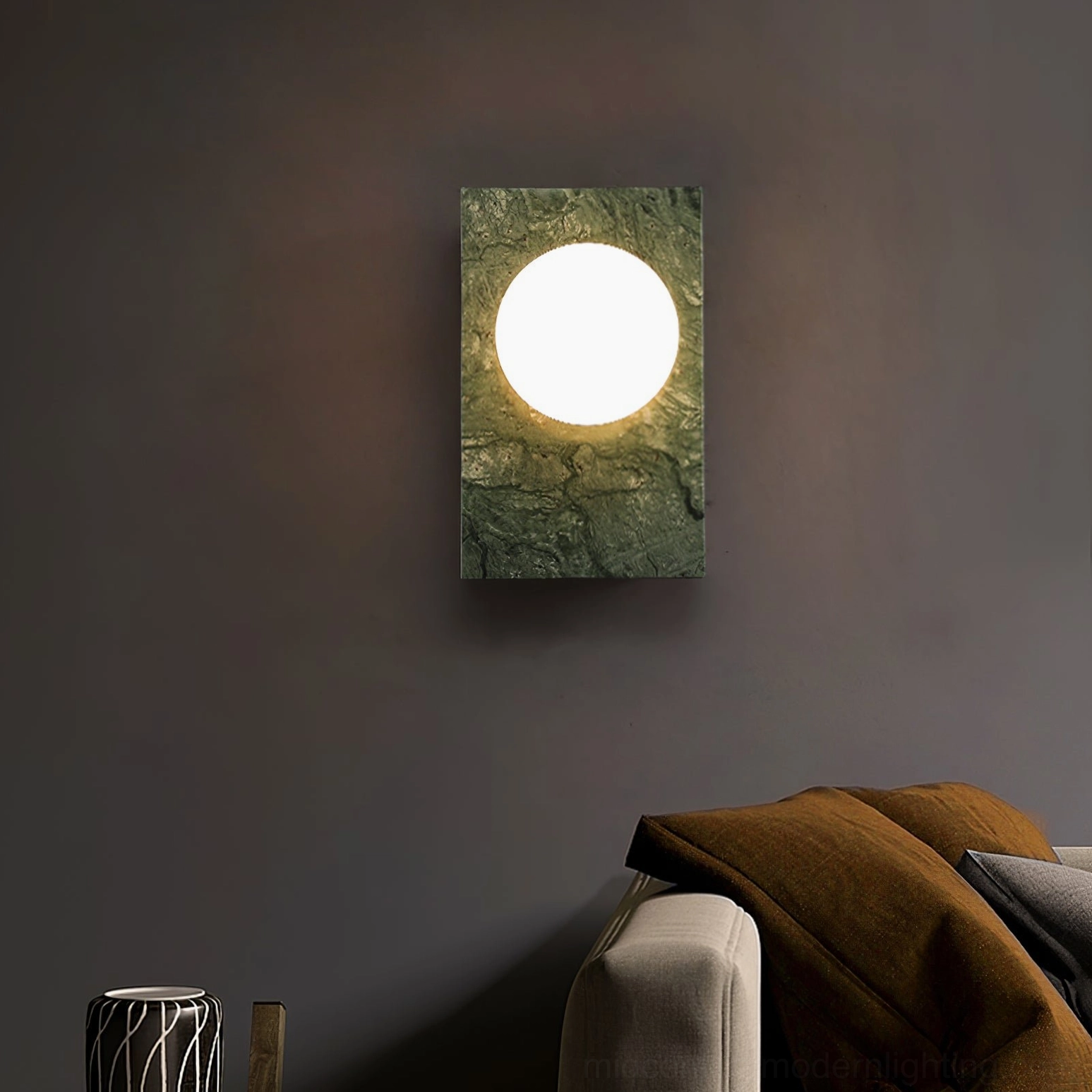 Compact Lan wall sconce in cozy living room producing warm ambient glow perfect for intimate spaces