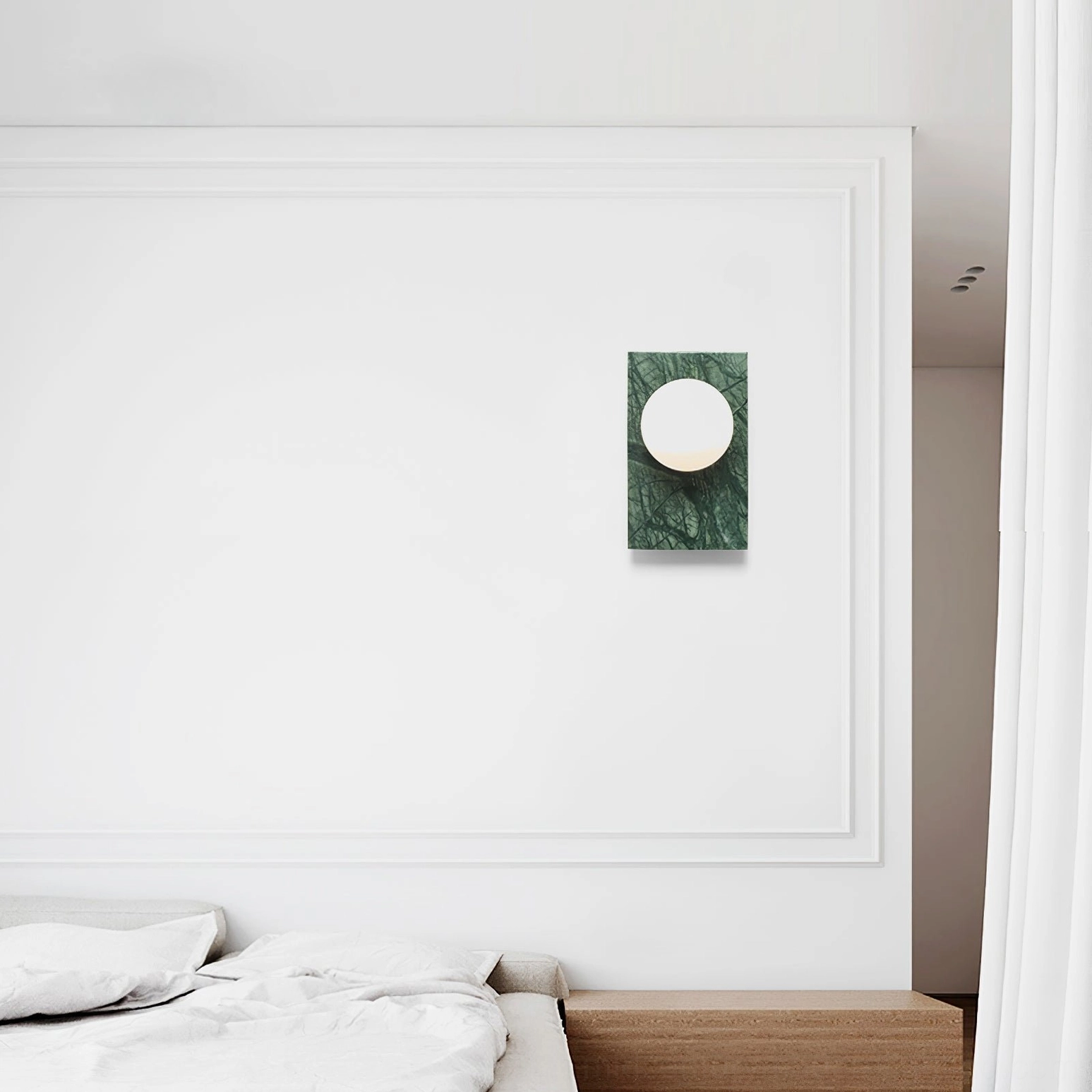 Contemporary Lan marble sconce variant showing warm Edison bulb compatibility and brass mounting hardware