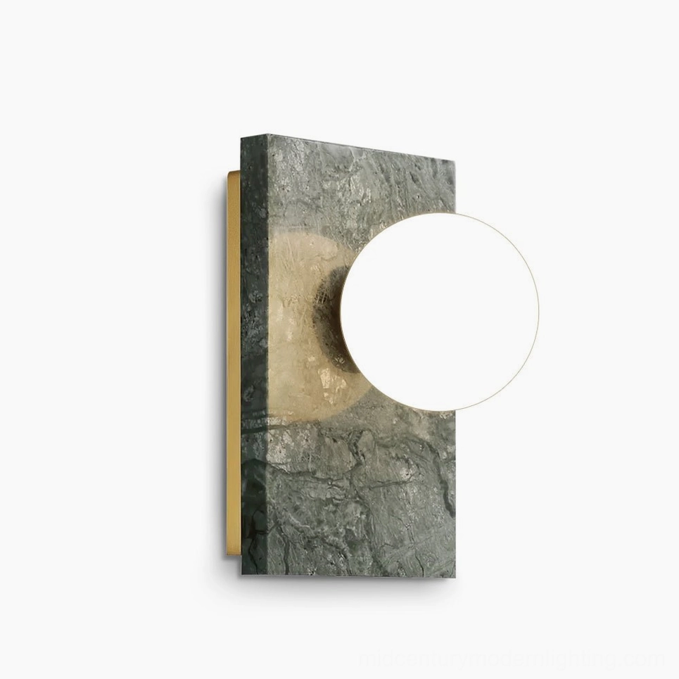 Lan marble wall sconce with frosted glass globe and brass hardware on white studio background - modern mid-century design