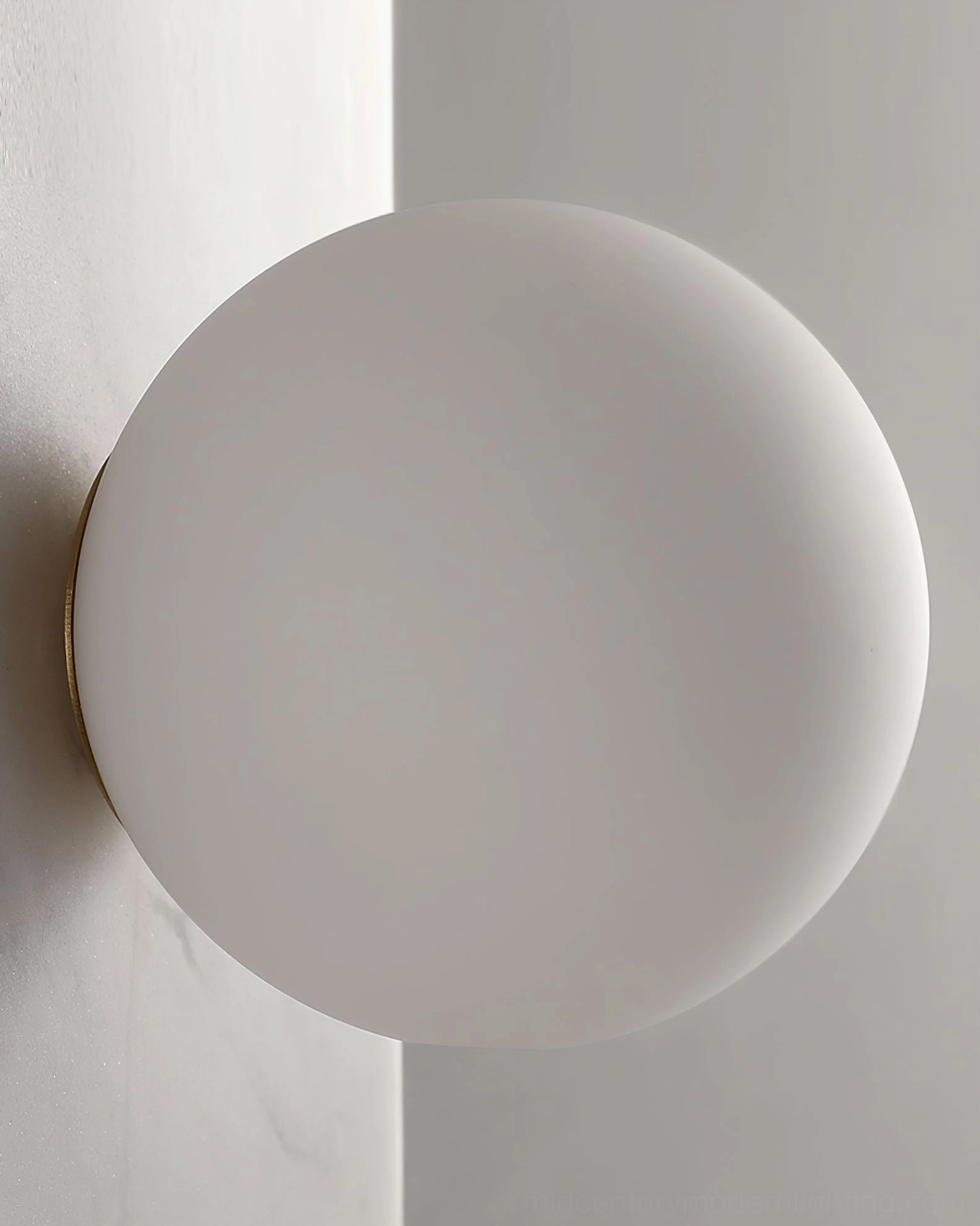 Lan wall sconce mounted installation view showing compact wall-mounted positioning and spatial impact