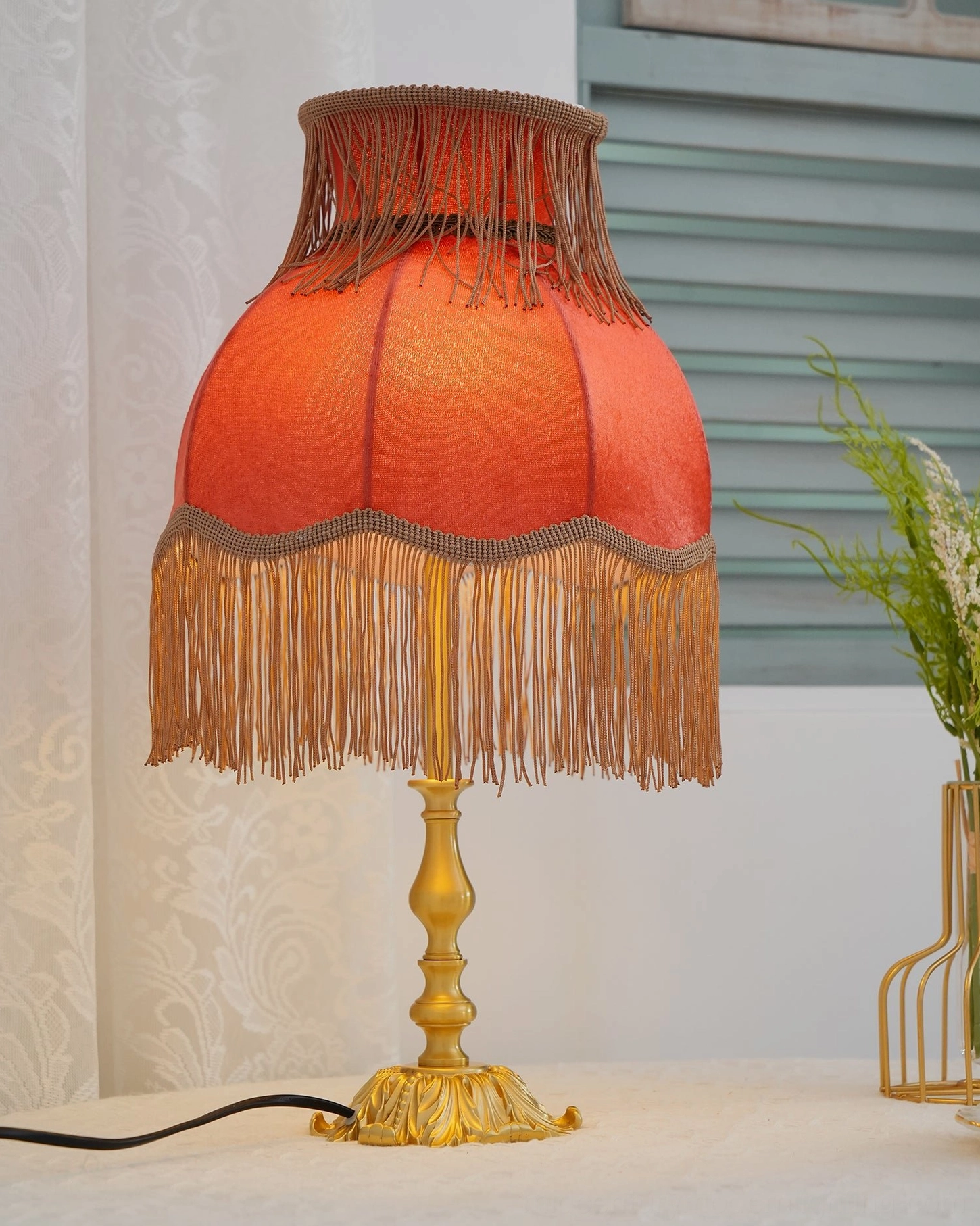 Lanna red tassel table lamp burgundy shade with fringe trim carved brass base side table styling