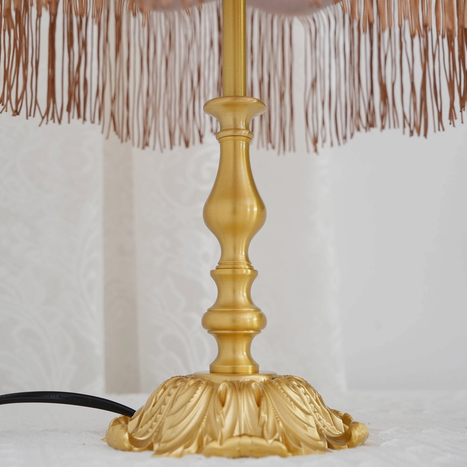 Lanna tassel table lamp burgundy shade brass stem warm interior lighting global eclectic style