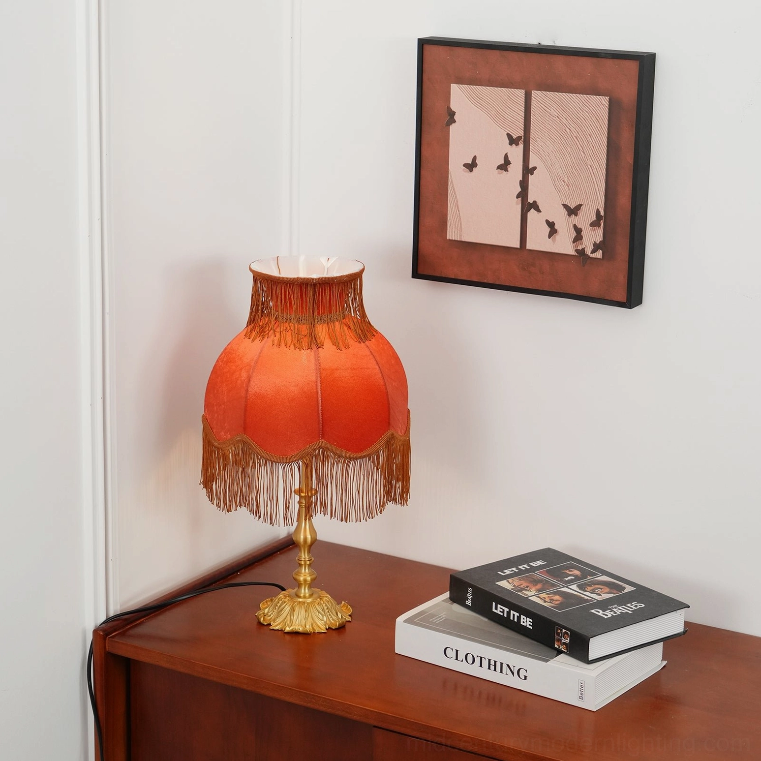 Lanna tassel table lamp on wooden cabinet with books vintage home decor warm brass lighting