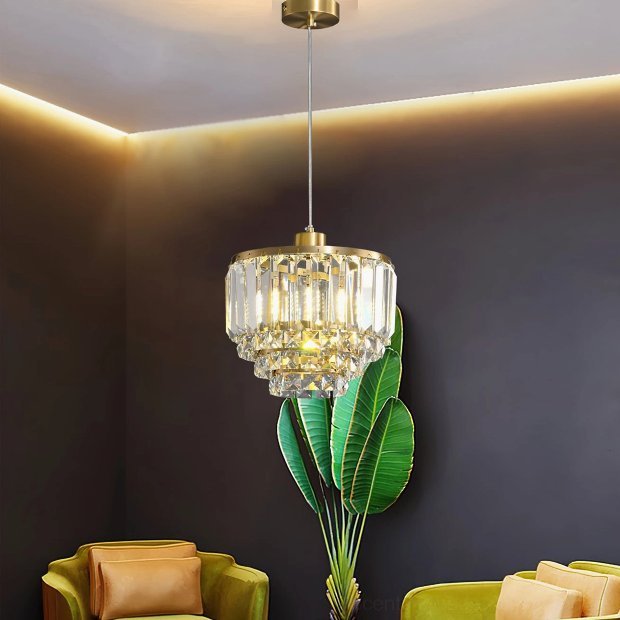 Luxury living room lounge tiered crystal brass pendant tropical greenery warm interior tones