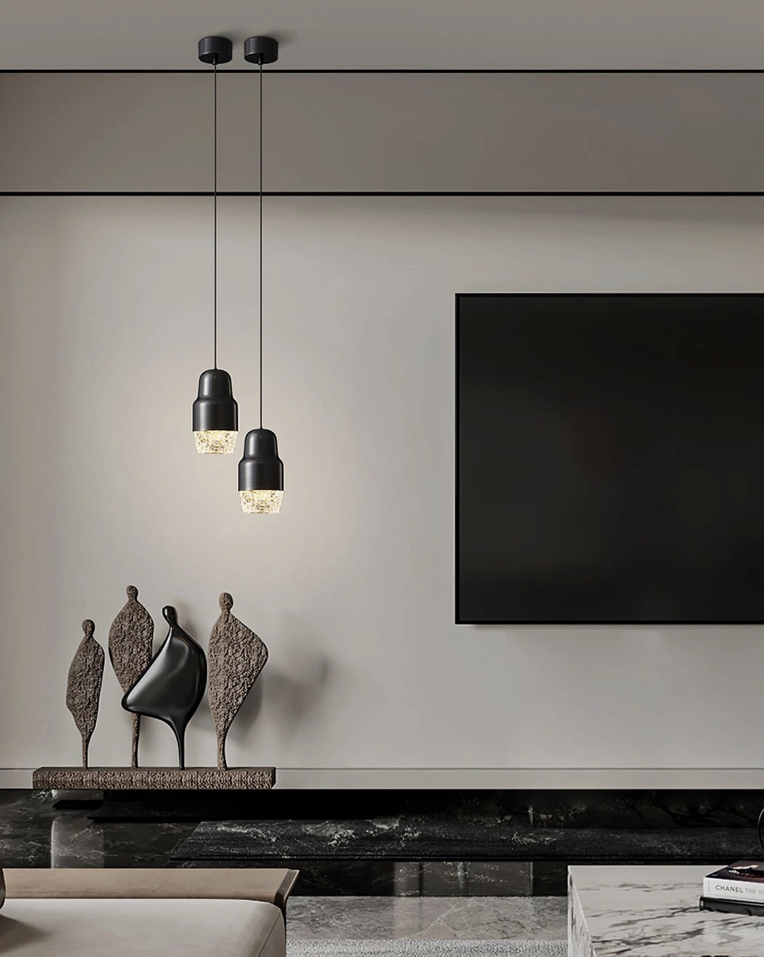 Pair of black matte Lavinia pendant lamps installed on TV feature wall, coordinated dual fixture design