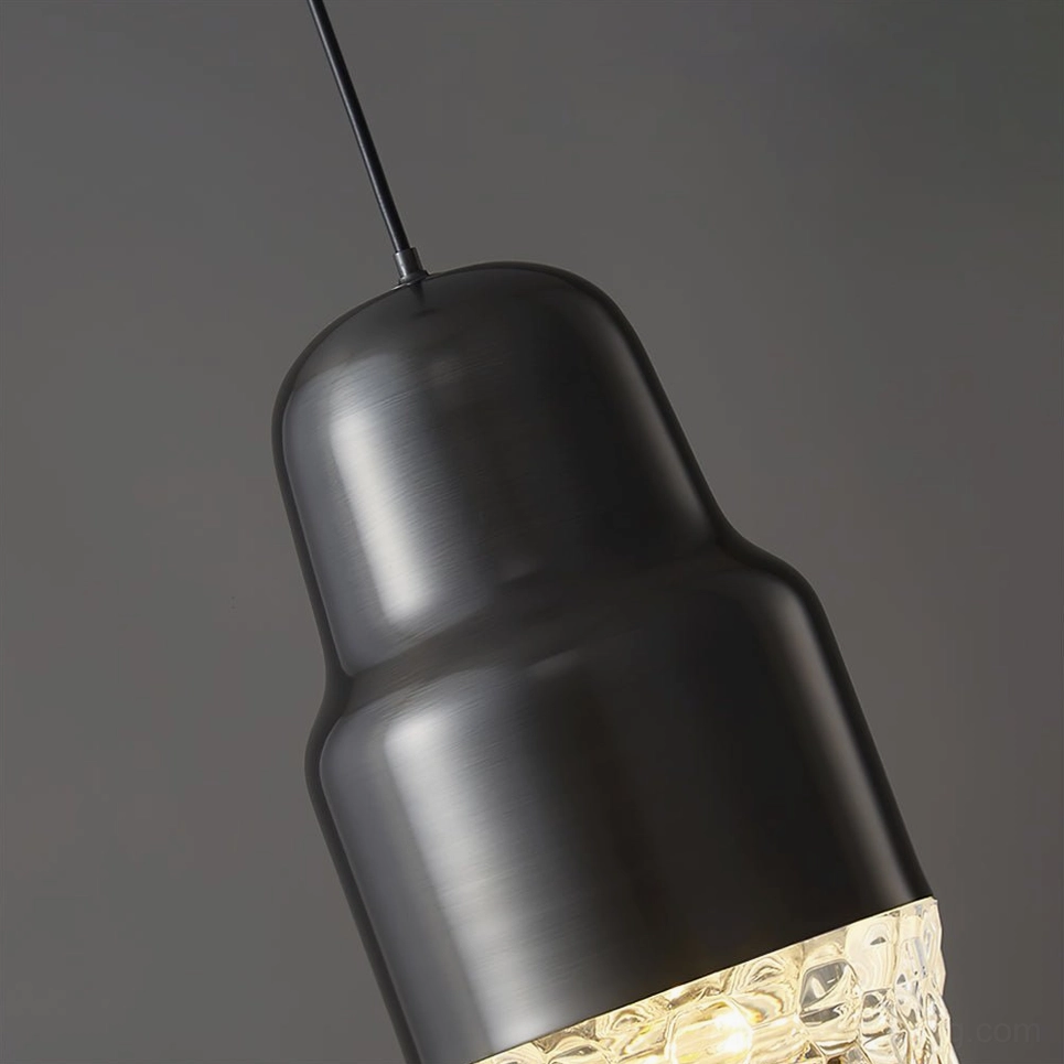 Side angle close-up of Lavinia pendant body showing brushed metal tiered design and construction