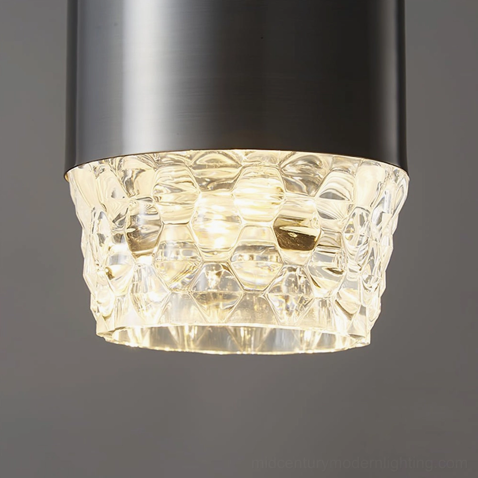Close-up detail of Lavinia acrylic shade showing honeycomb texture pattern, illuminated from within
