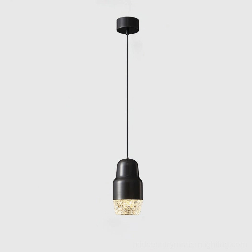Black Lavinia three-color changing LED pendant light with brass components, warm industrial modern aesthetic
