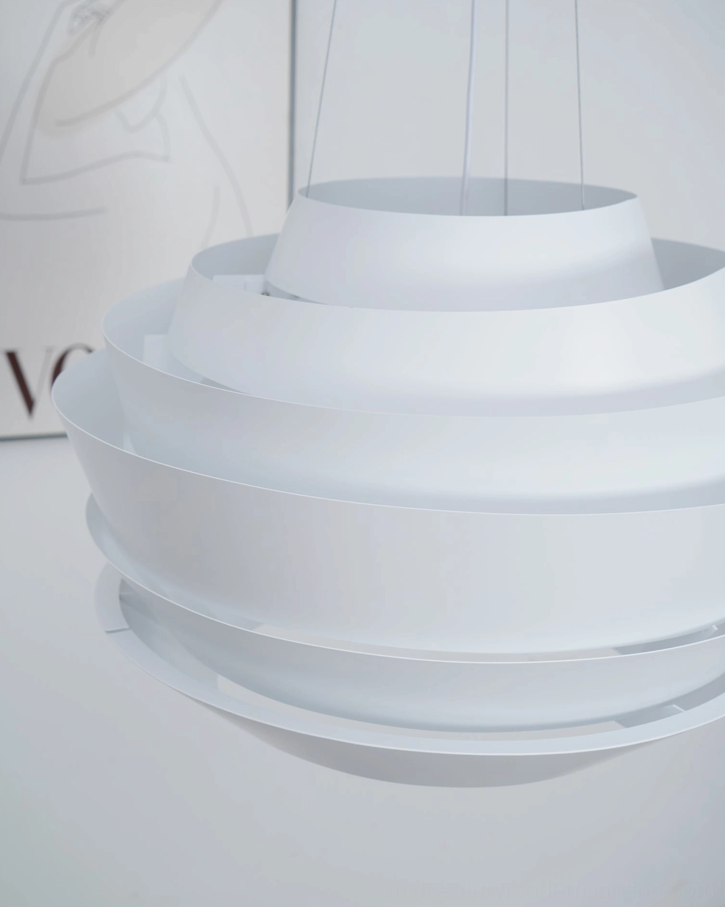 Sunburst pendant lamp in contemporary bedroom setting above bedside area ambient lighting