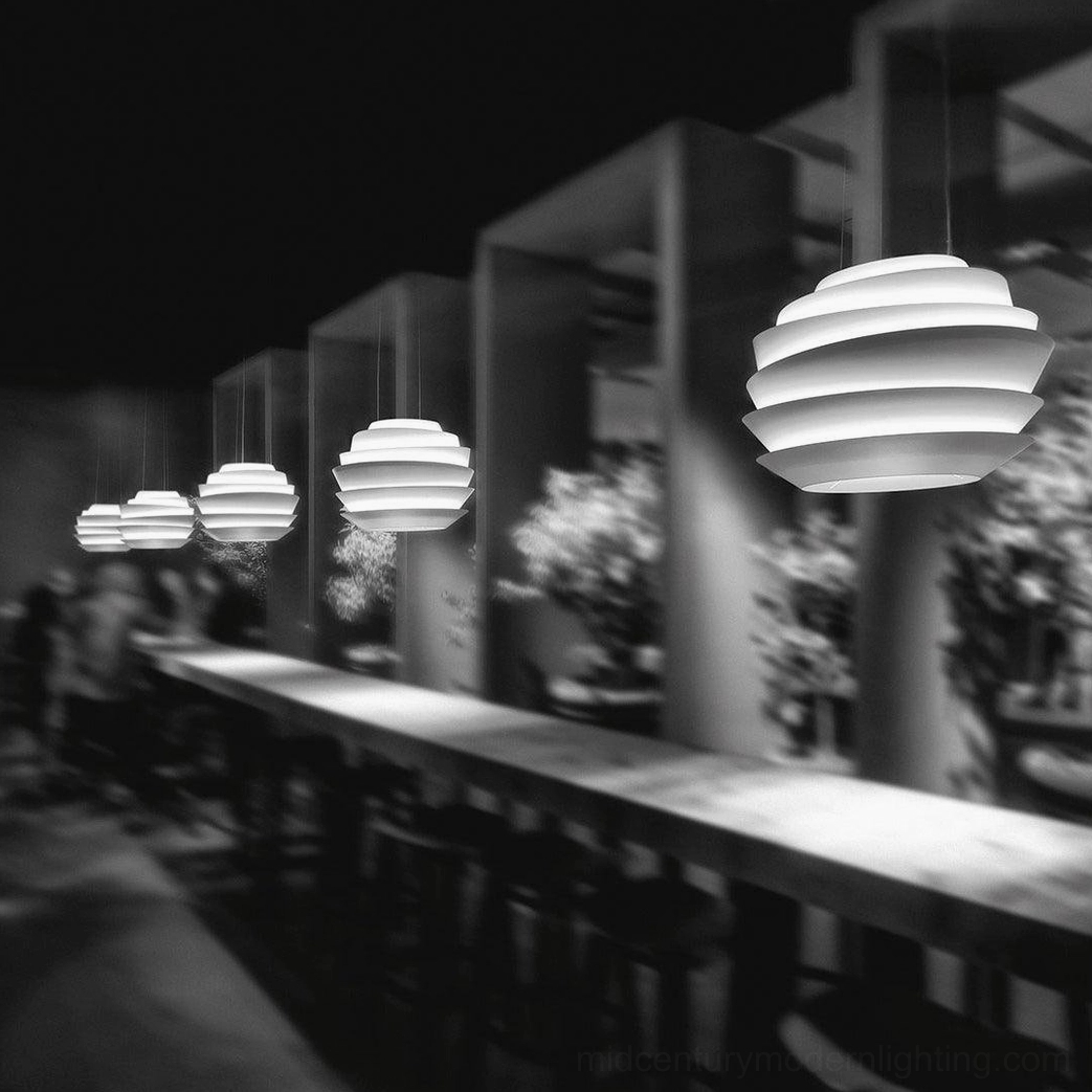 Tiered ceiling pendant lamp restaurant hospitality environment sophisticated lighting