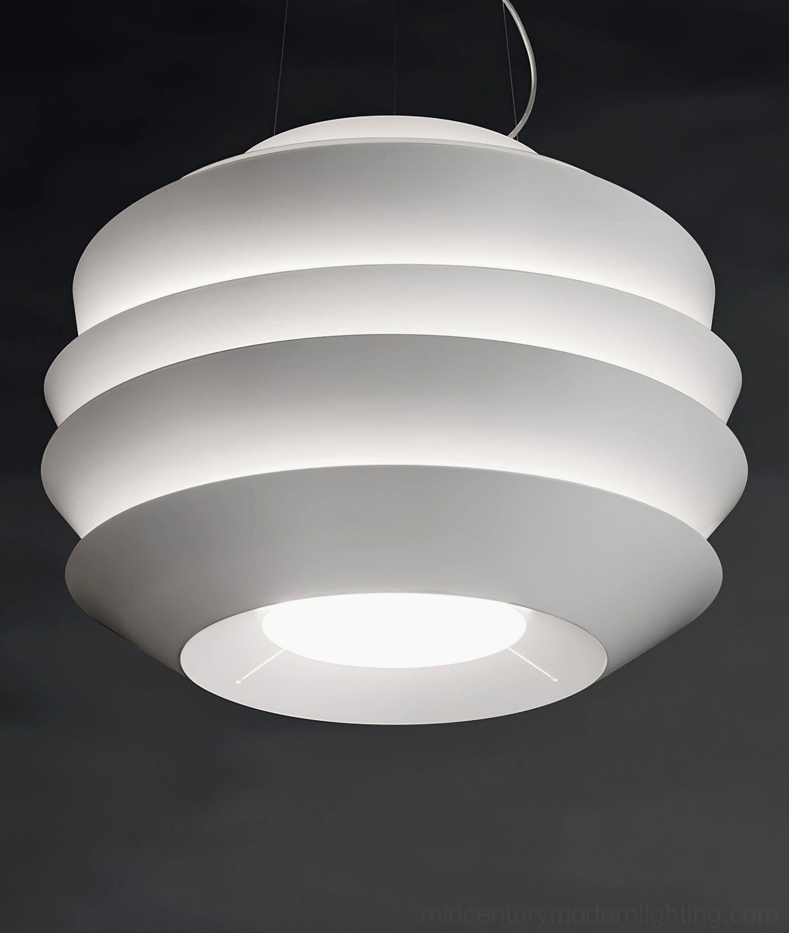 Le Soleil pendant lamp white tiered fixture dynamic shadow play light architecture