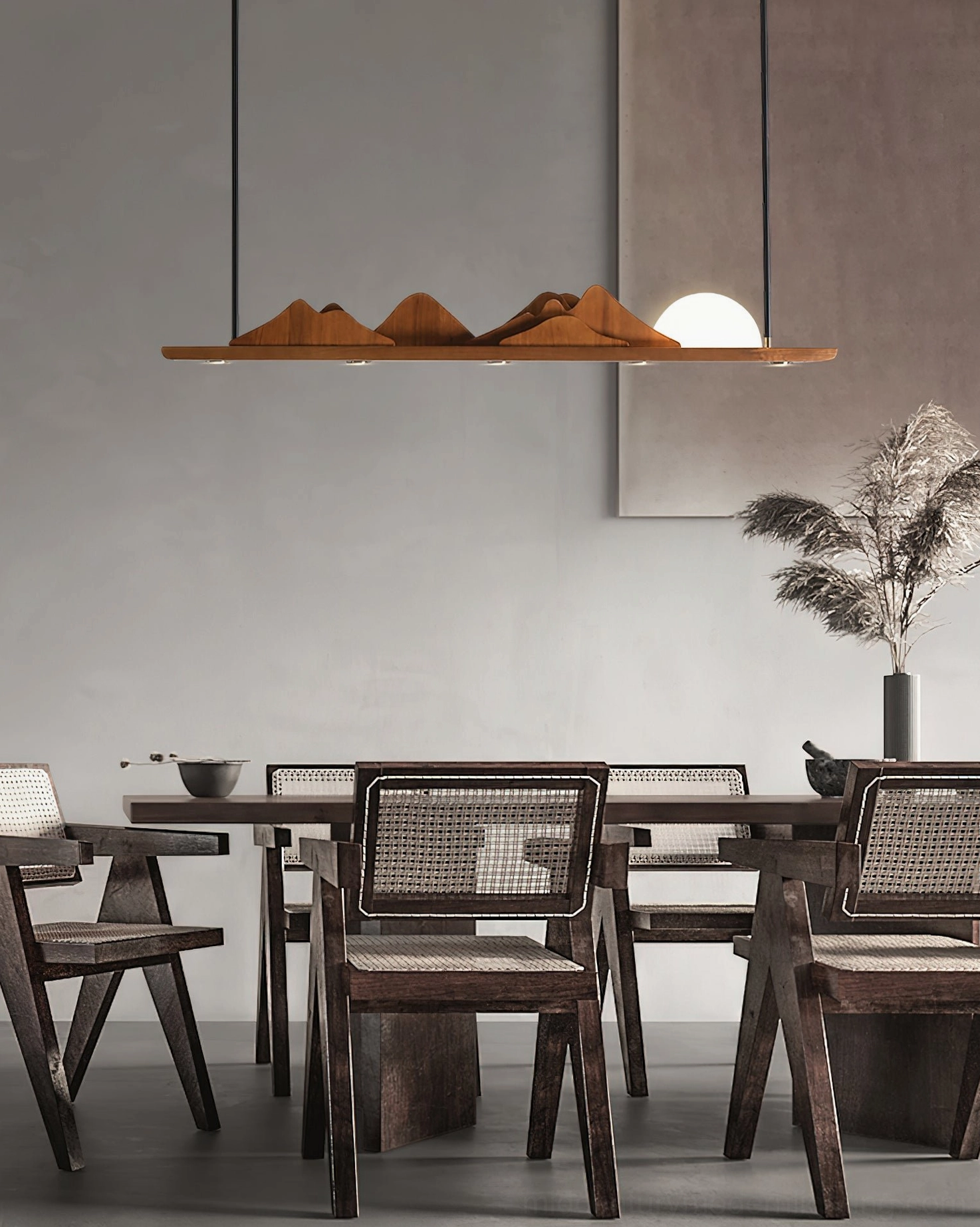 Leah Mountains sculptural pendant light – side view in minimalist oriental dining space with rattan chairs and wood finish