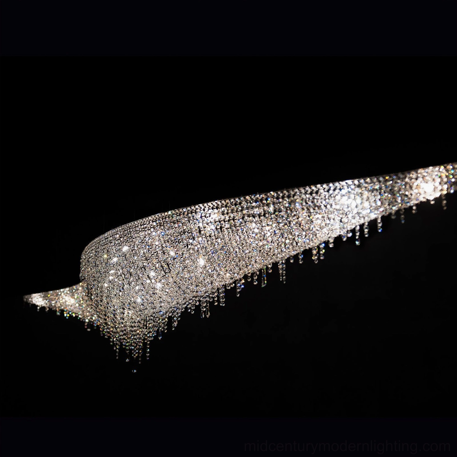 Extreme close-up of leaves crystal chandelier demonstrating sparkling opaque crystal surface and sleek stainless steel profile
