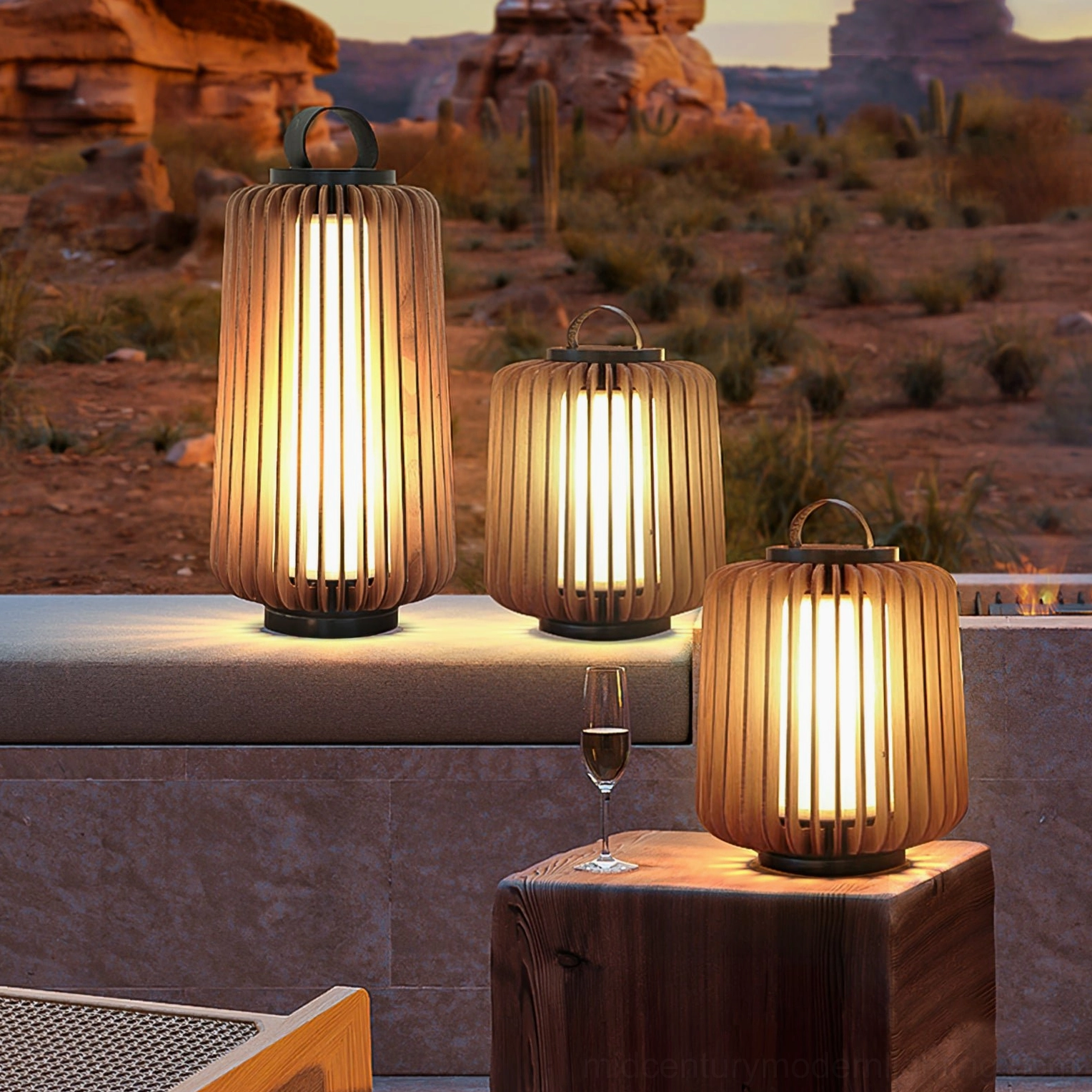 Legno wooden outdoor table lamps on desert patio with warm glowing light and western architecture