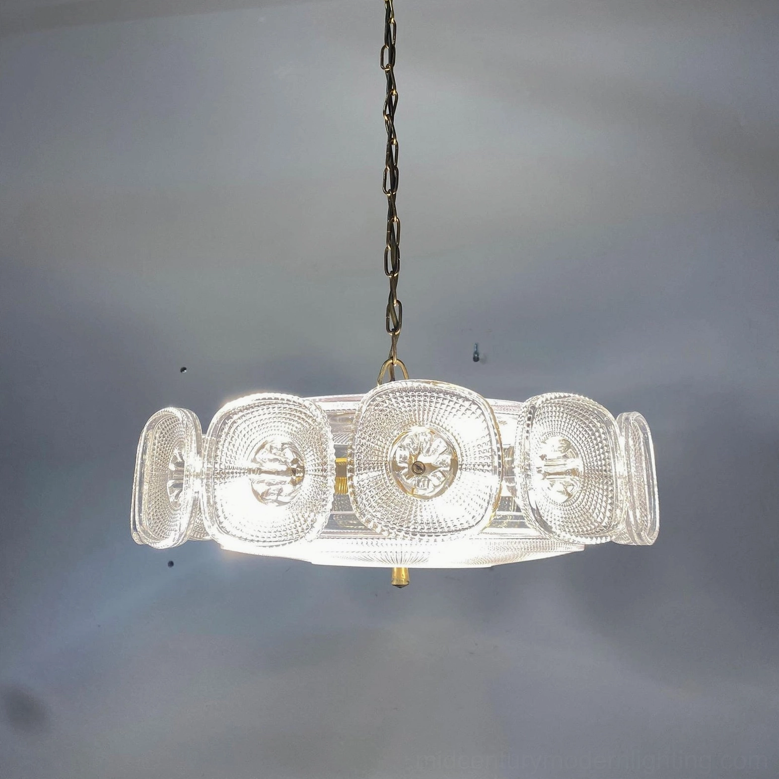 Lennox brass ring chandelier concentric frame design mid-century geometric lighting