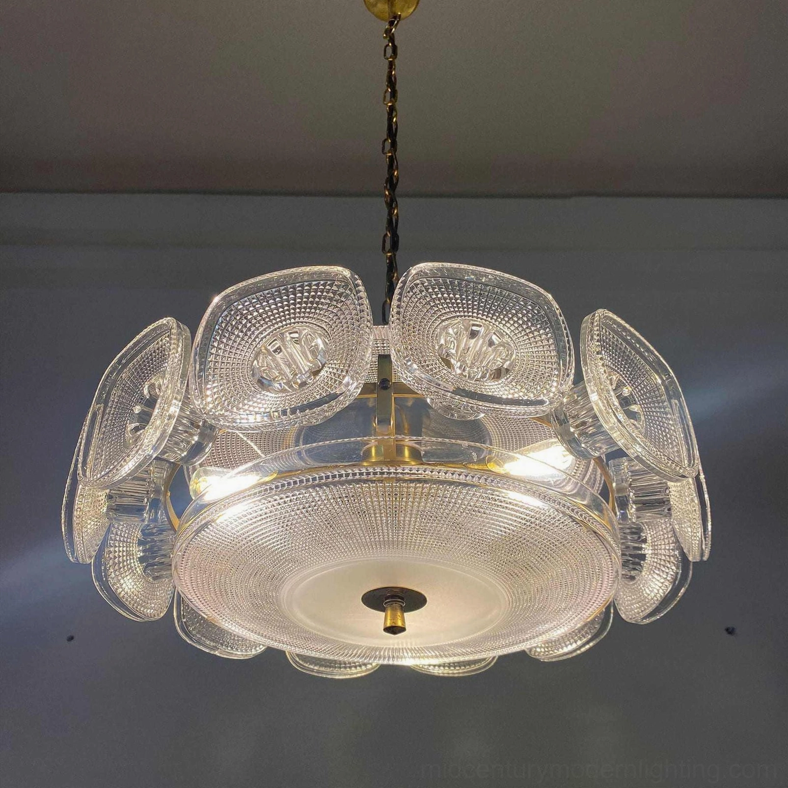 Lennox glass ring pendant light architectural installation angle view modern interior
