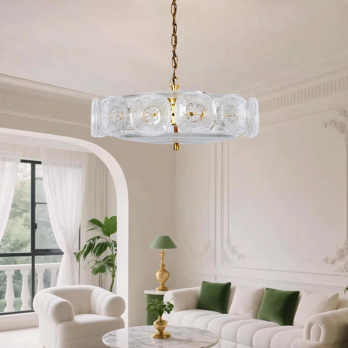 Lennox clear glass pendant light above round coffee table and white sofa mid-century design