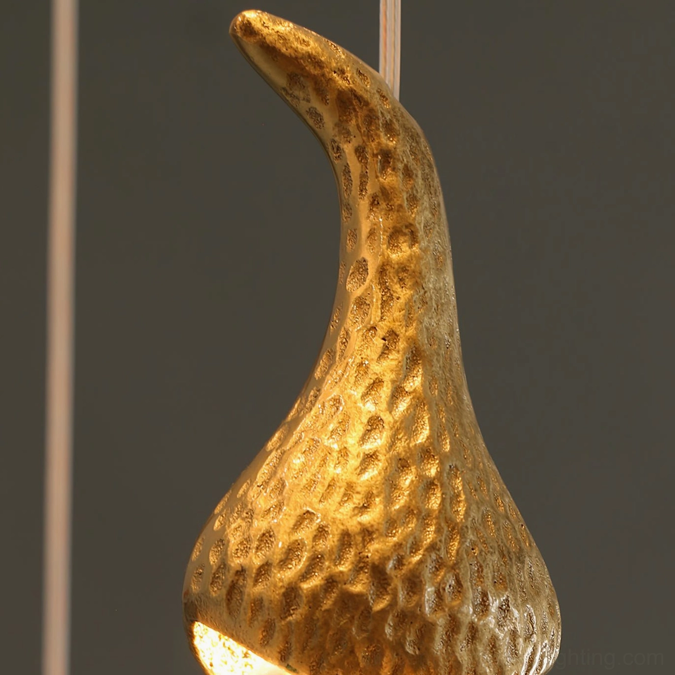 Close-up detail of Leo Bubble Chandelier brass cap with hammered gold texture finish