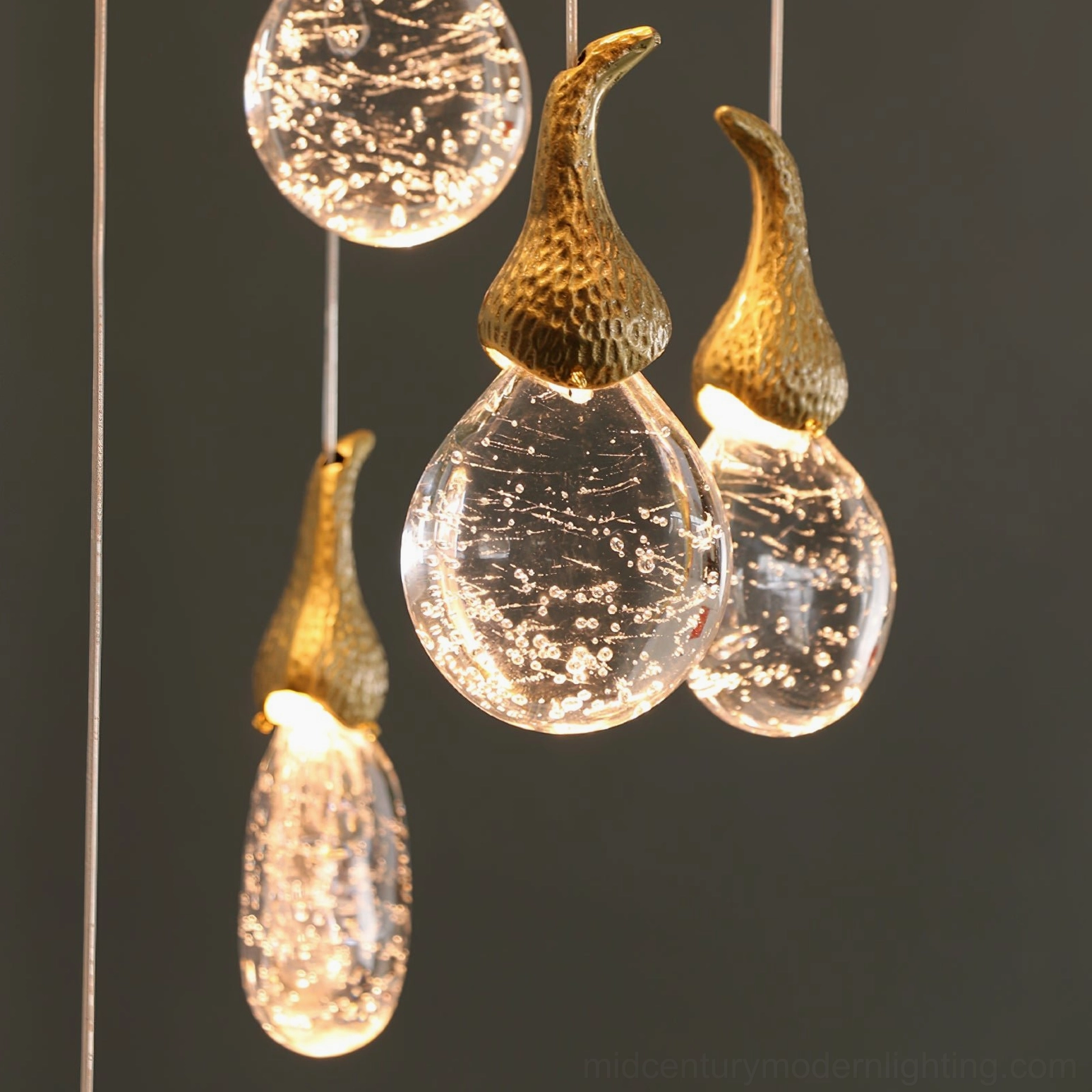 Leo Bubble Chandelier detail shot showing bubble texture inside glass with warm illuminated glow