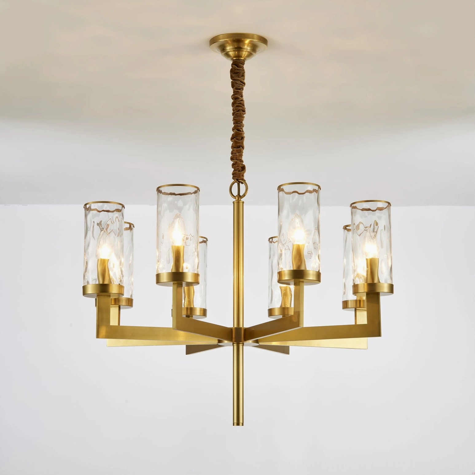 Liaison chandelier architectural presence in living space with high ceiling