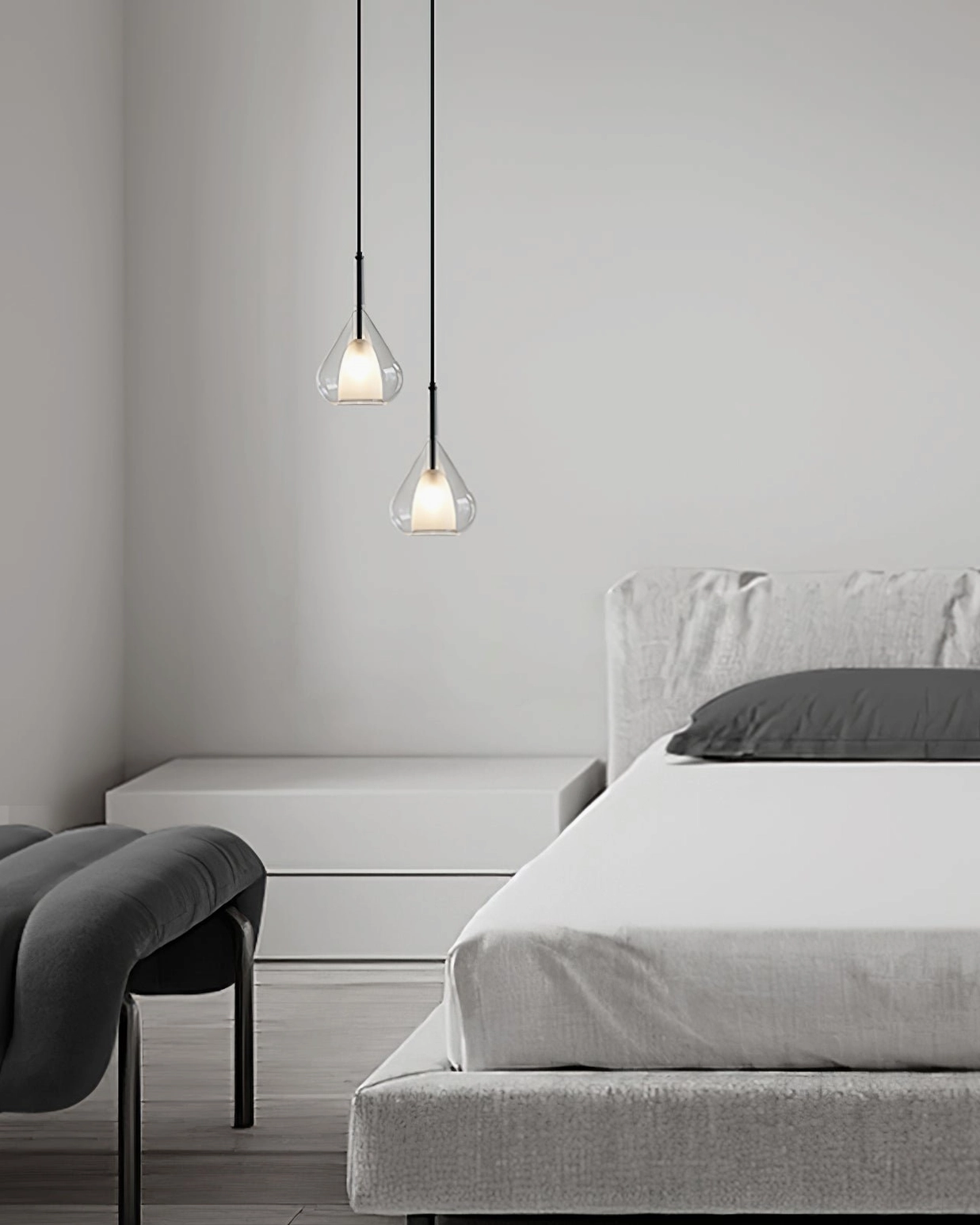 Dual Lila teardrop pendants in minimalist master bedroom with soft warm ambient lighting atmosphere