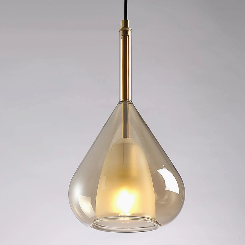Lila teardrop pendant in cognac glass showing warm amber light transmission and ambiance