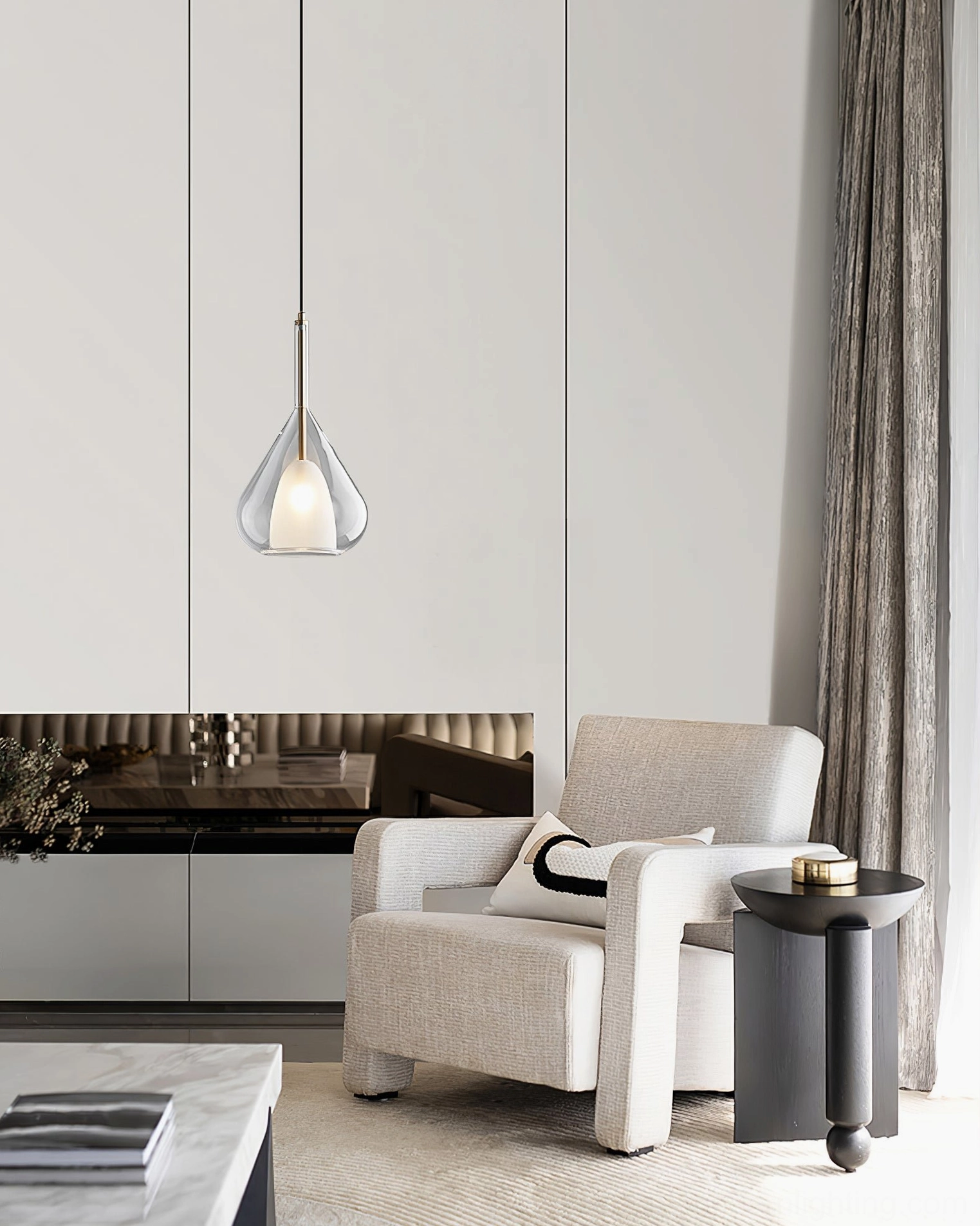 Lila teardrop pendant in cognac glass shade with warm amber light output and modern styling