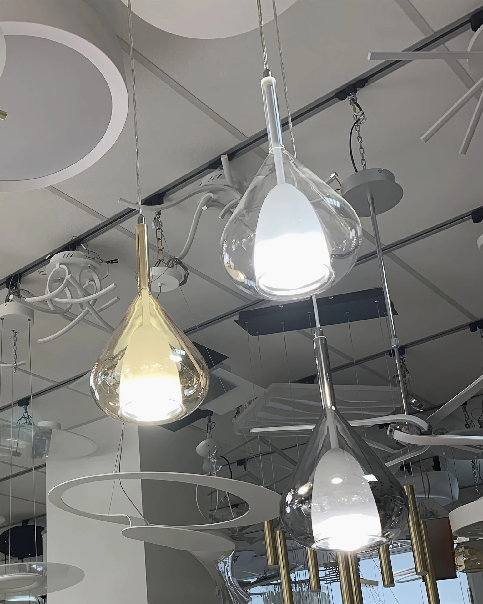 Lila teardrop pendant installed in gallery or retail space demonstrating commercial application