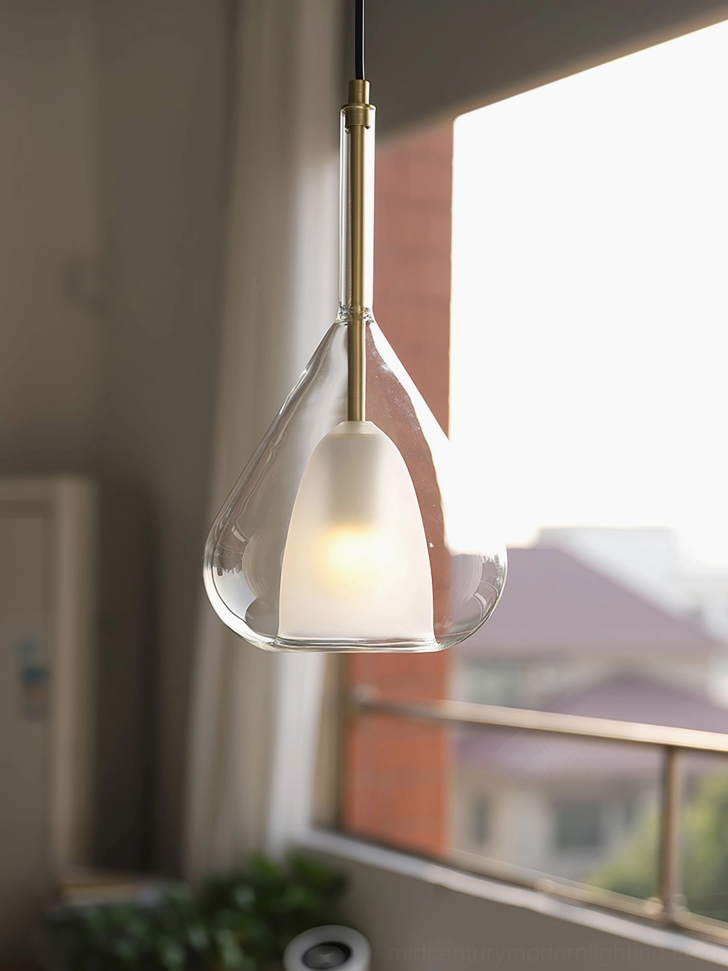 Lila pendant architectural detail showing teardrop shape and double-glass layered construction