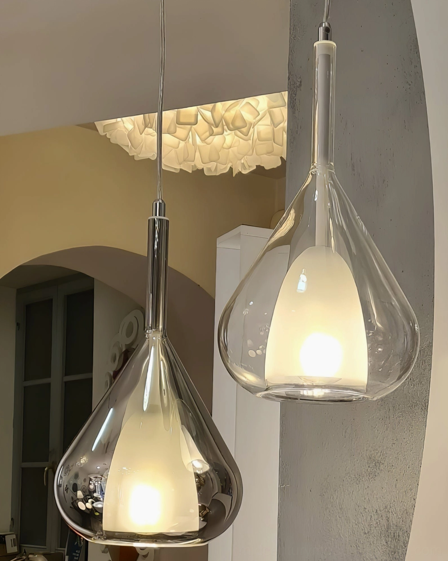 Lila pendant suspended above work surface or dining table showing proper installation height