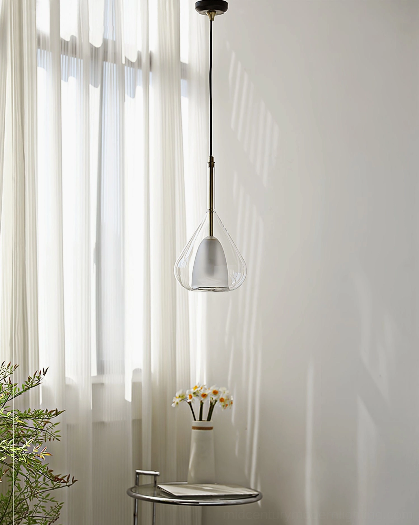 Lila teardrop pendant with clear glass in contemporary kitchen or dining area application