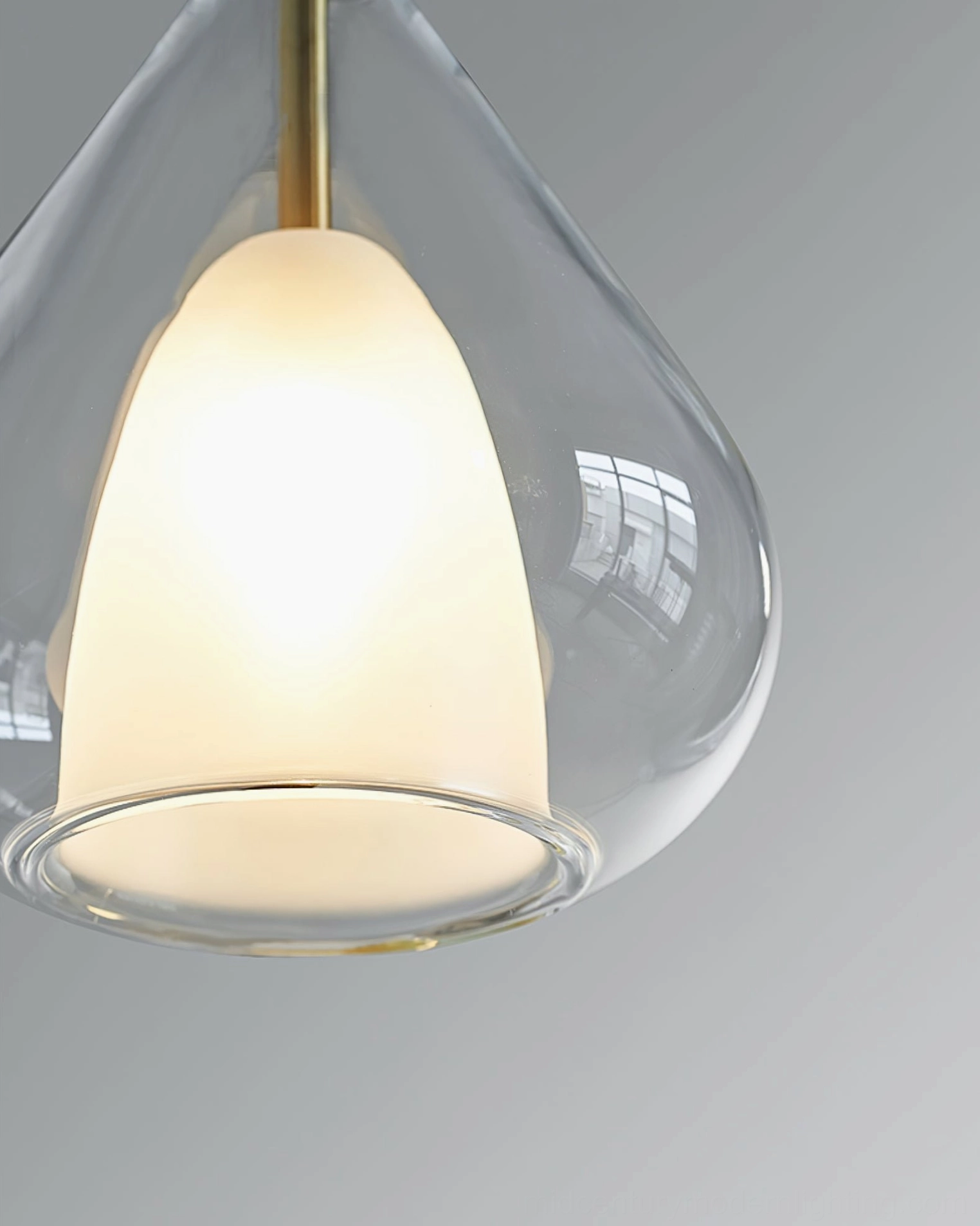 Lila pendant showing light diffusion effect through layered glass shades