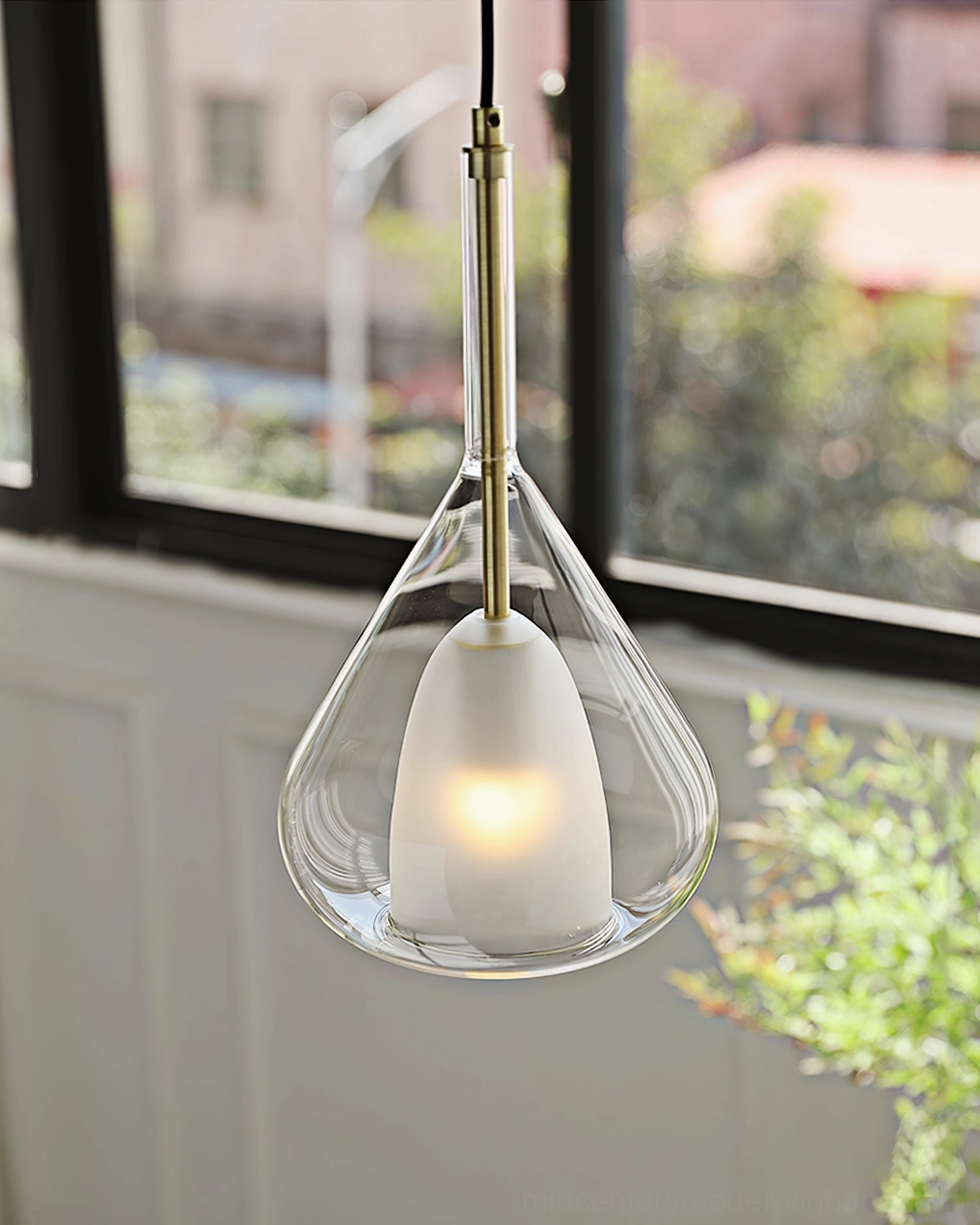 Lila teardrop pendant in modern minimalist interior with clean lines and neutral palette