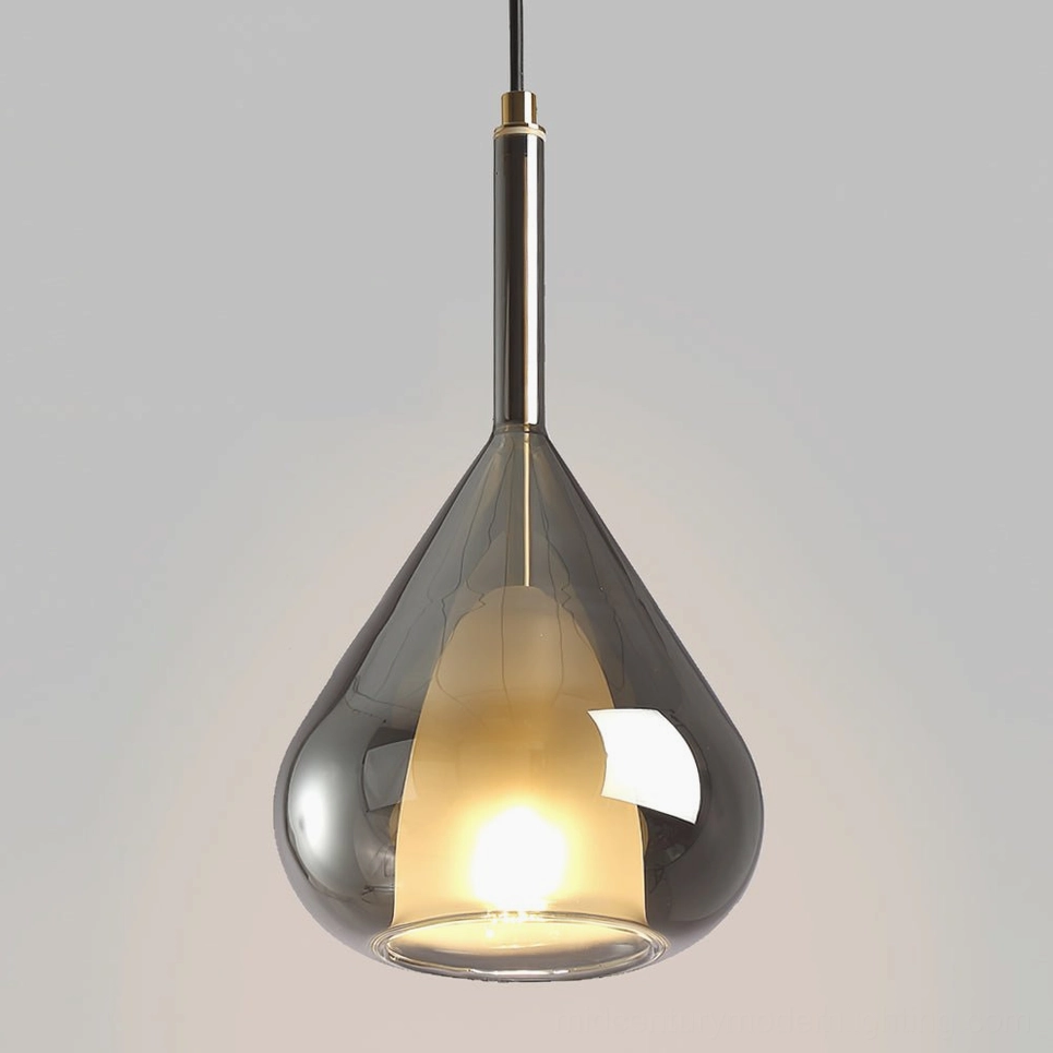 Lila pendant in smoke grey glass creating sophisticated muted lighting effect and depth