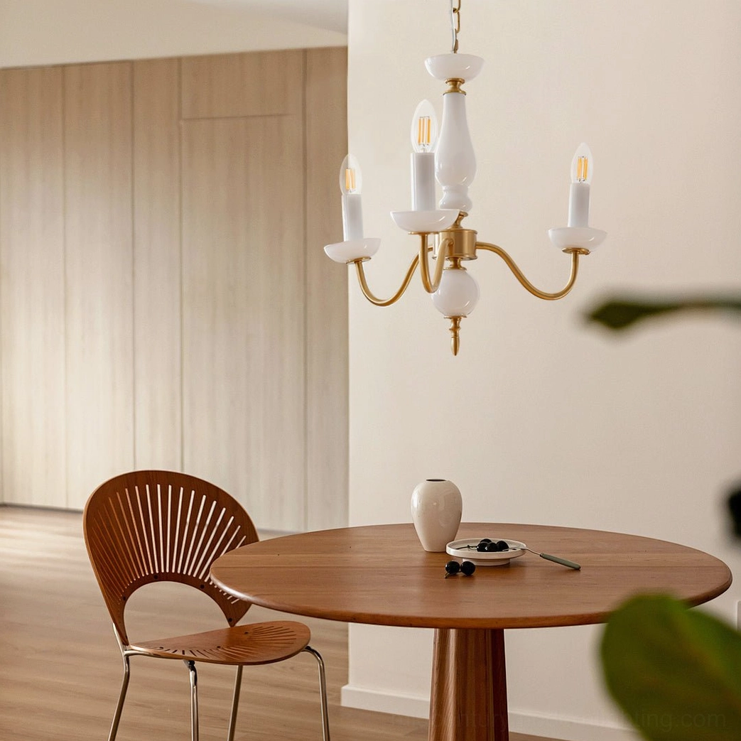 3-head and 6-arm brass candle chandelier in neutral minimalist wooden dining room aesthetic